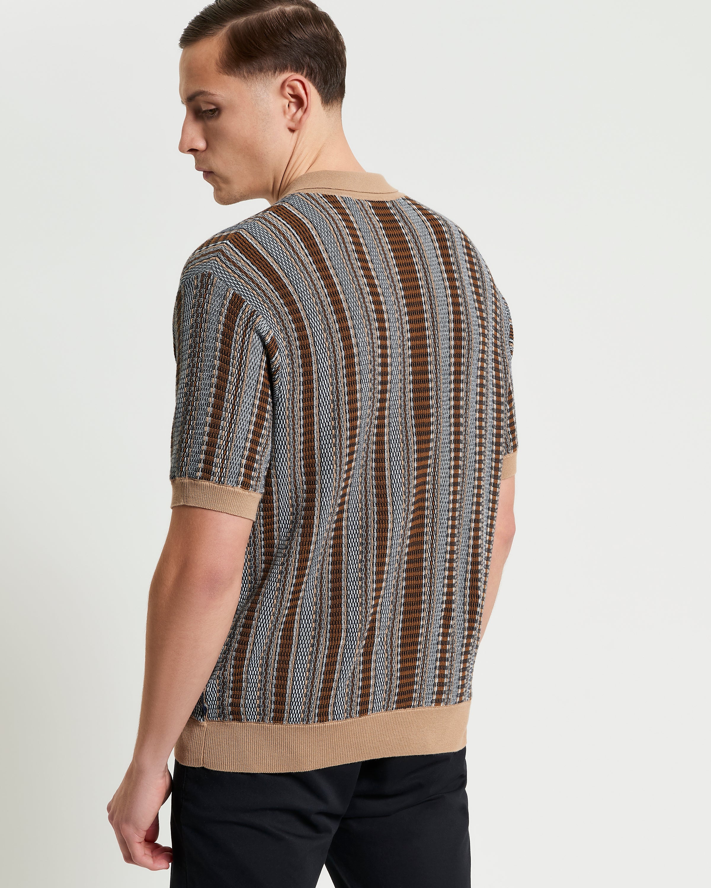 Textured Stripe Knitted Shirt – Back view showcasing the striking textured stripe design and comfortable fit.