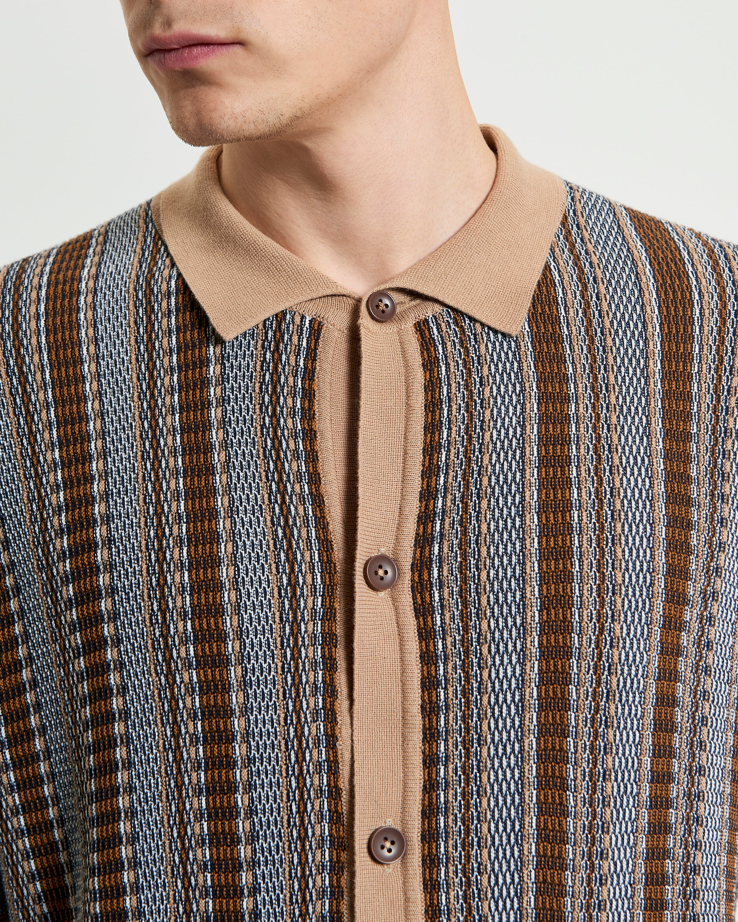 Textured Stripe Knitted Shirt in brown and blue, featuring a button-through front and collar.