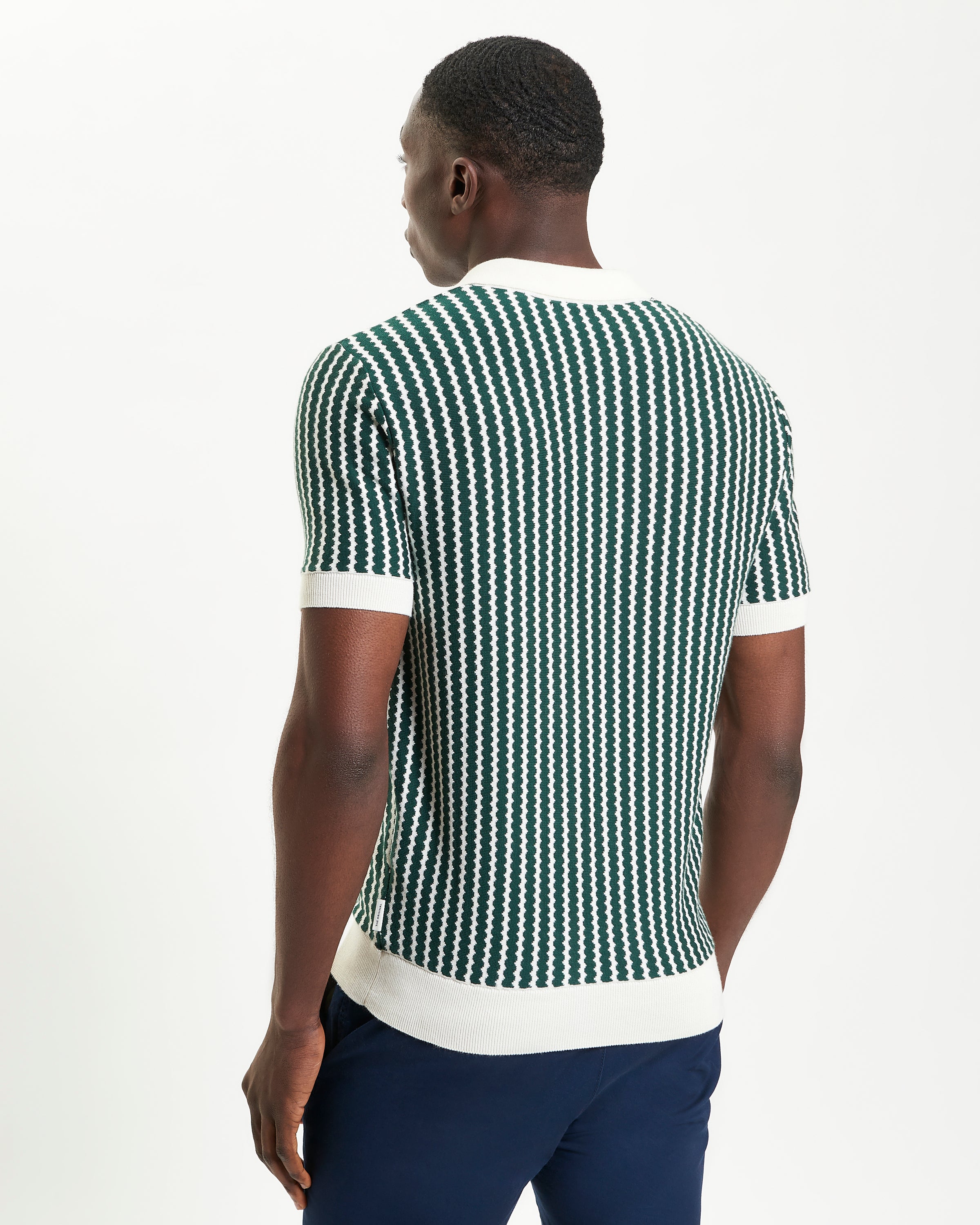 Vertical Wave Polo – Green and white vertical wave design, relaxed fit cotton polo with open neckline.