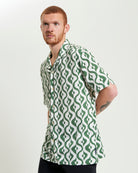Carnaby Geo Print – Short sleeve shirt with revere collar in green and white geometric pattern.