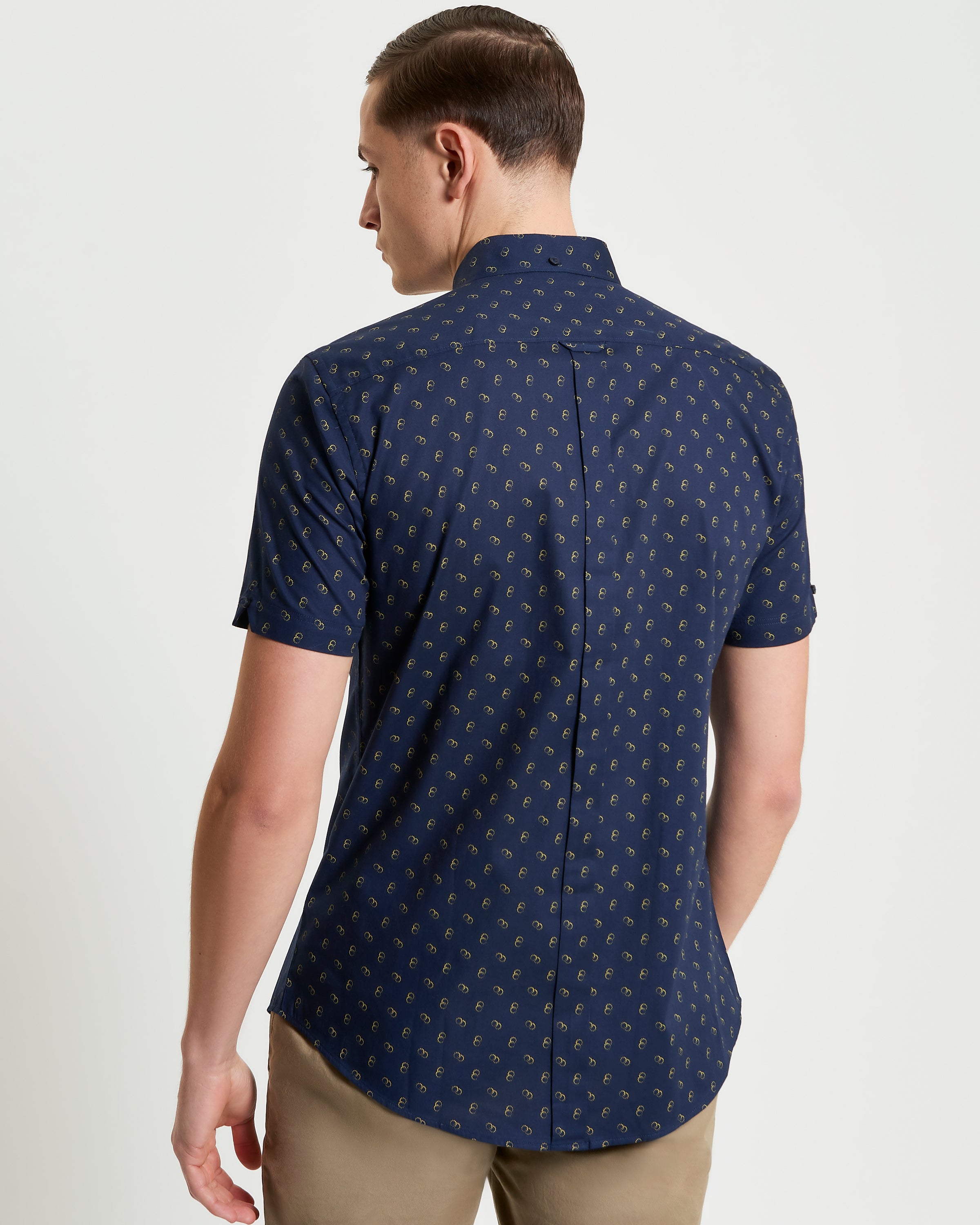 Stipple Print Shirt – Back view showcasing organic cotton fabric and curved hem.