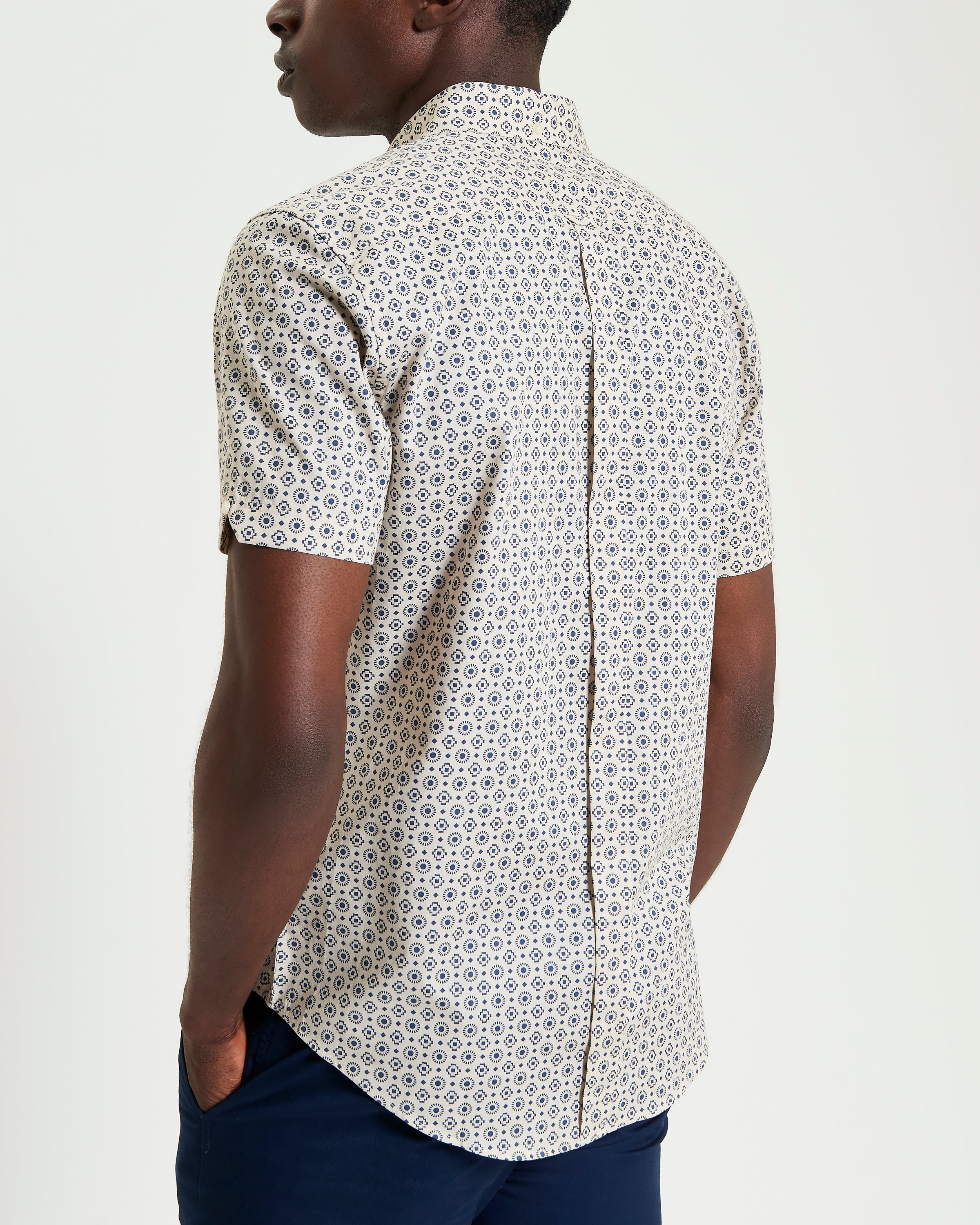 Block Geo Print short sleeve shirt with a stylish pattern and curved hem viewed from the back.