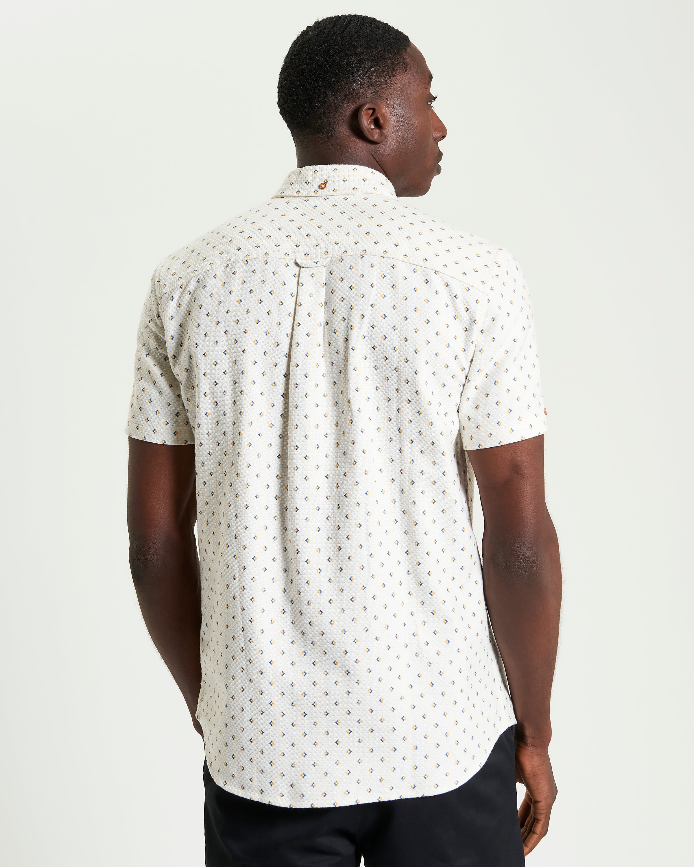 Split Geo Print short-sleeve shirt back view features bold split geo pattern and two-finger button-down collar.