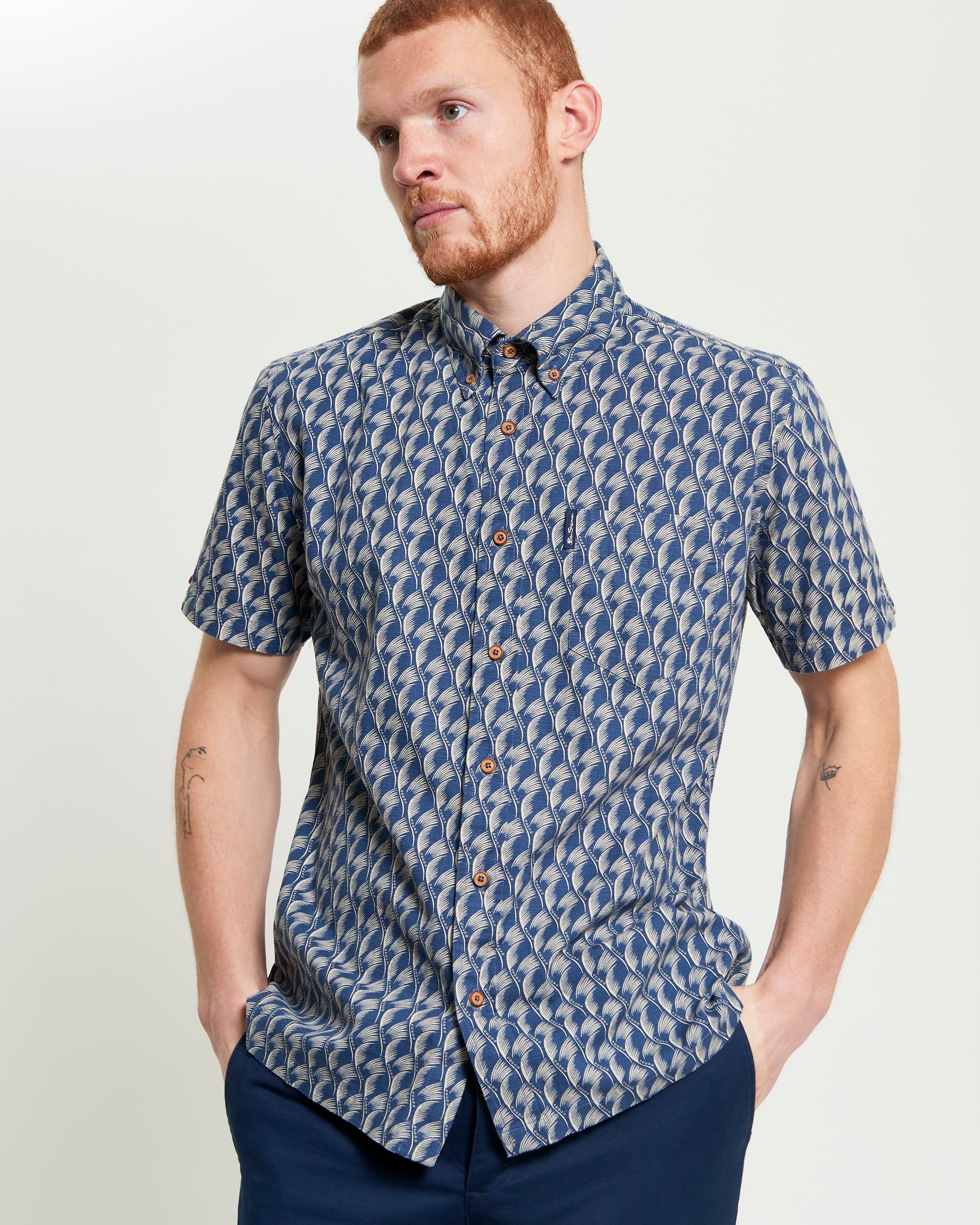 Block Leaf Print Shirt featuring a bold leaf pattern, crafted from cotton with a button-down collar.