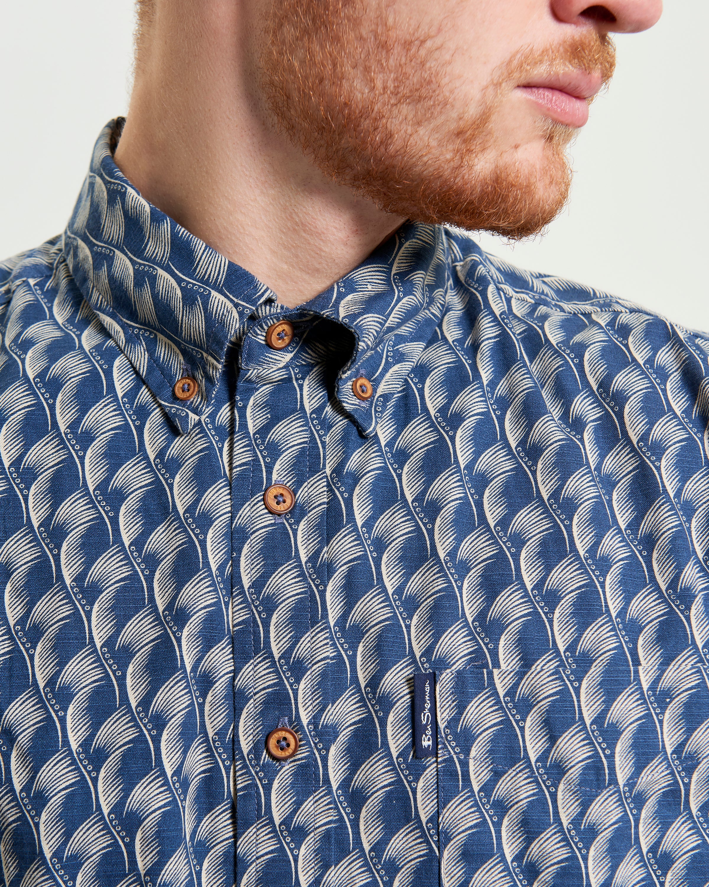 Block Leaf Print Shirt – Stylish cotton shirt with bold leaf pattern and button-down collar.