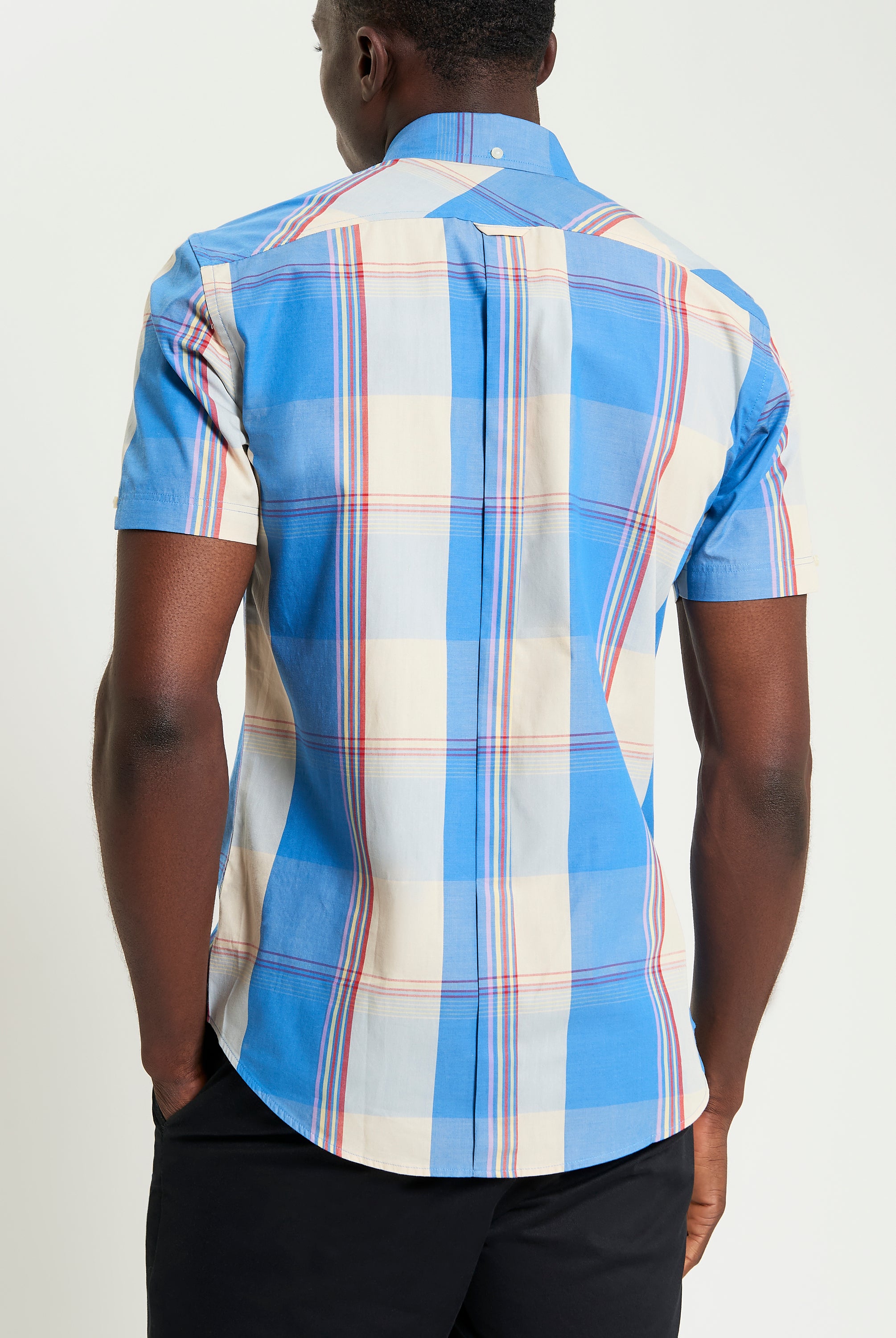 Multicolour Overcheck – Back view of short-sleeve shirt featuring blue and plaid pattern.