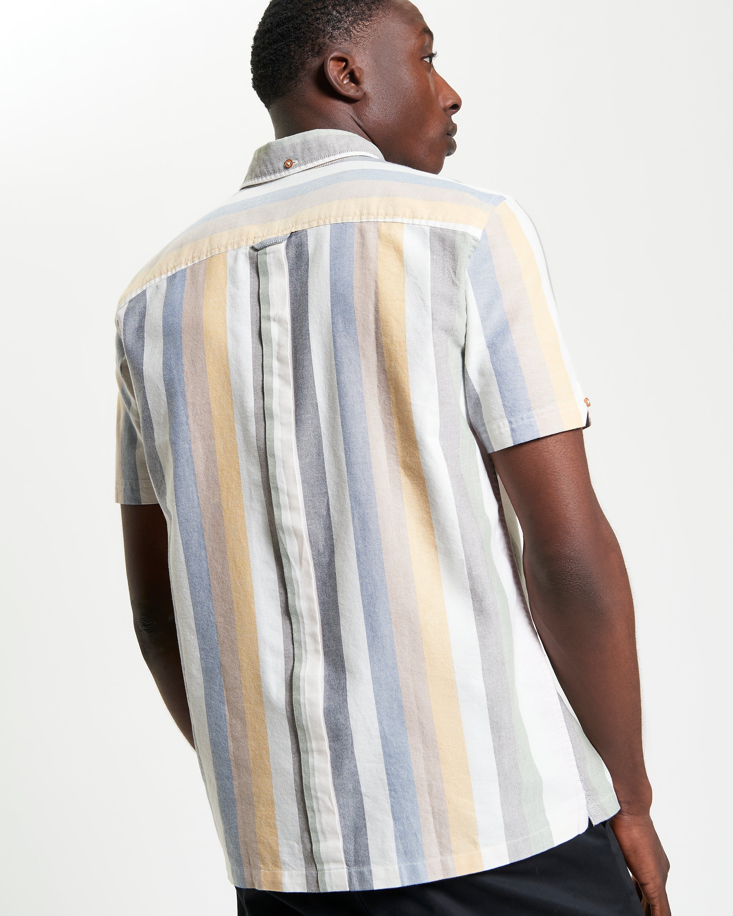 Candy Stripe shirt – back view showcasing vibrant stripes and three-finger button-down collar.