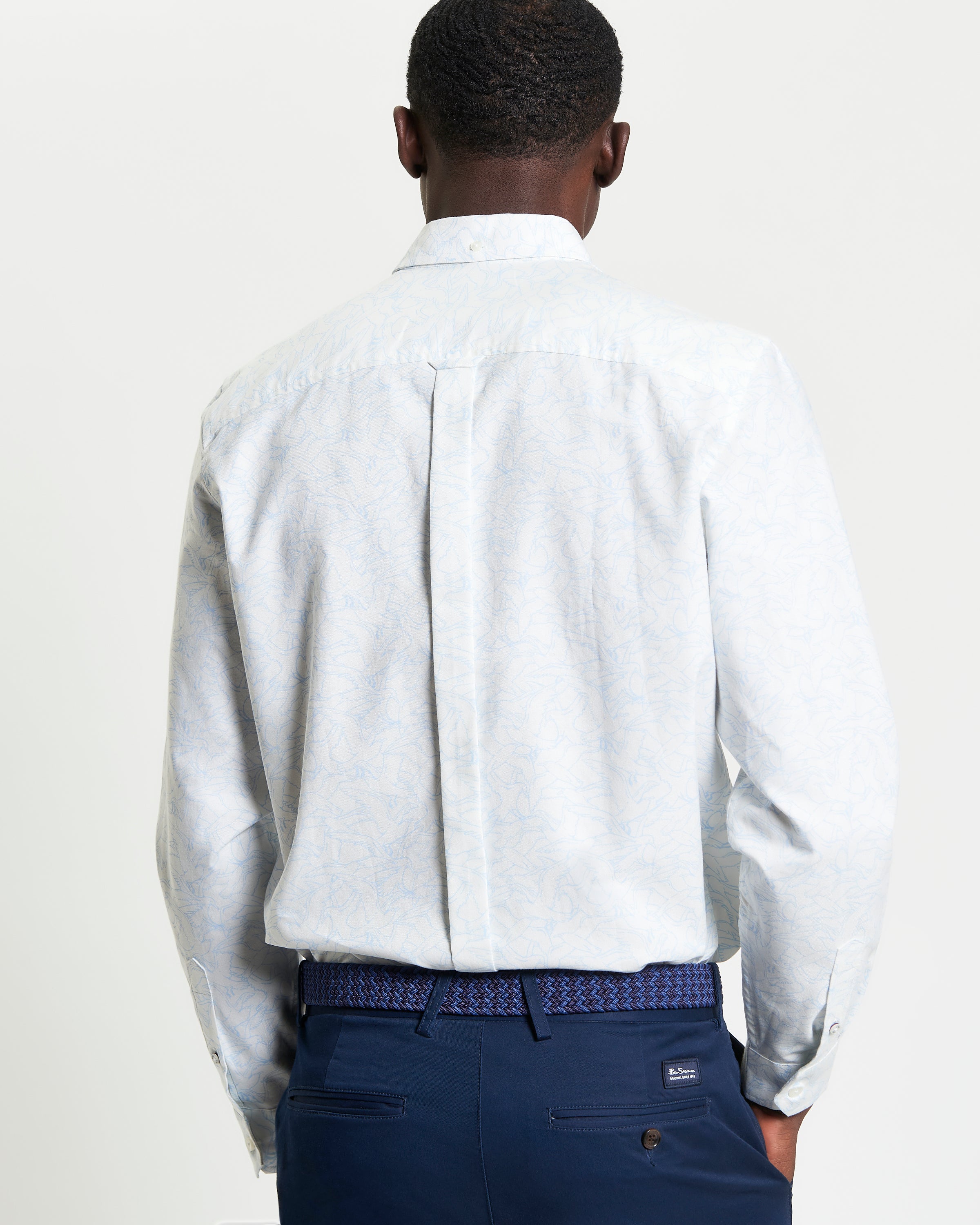 Back view of Seagull Print Shirt showcasing the two-finger button-down collar and curved hem in a classic fit.