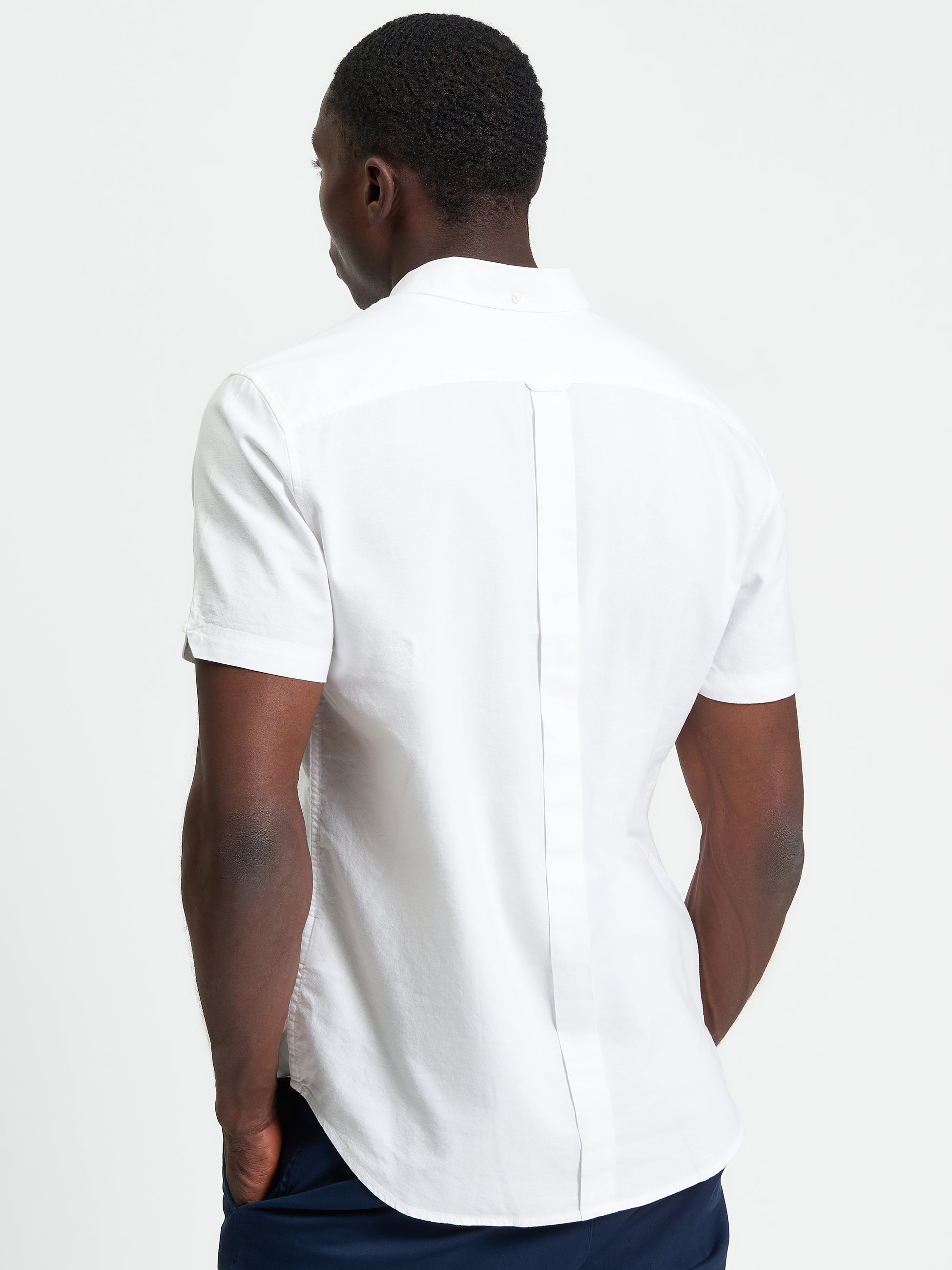 Signature Oxford Short Sleeve Shirt – Back view showcasing the minimalist design and organic cotton fabric.