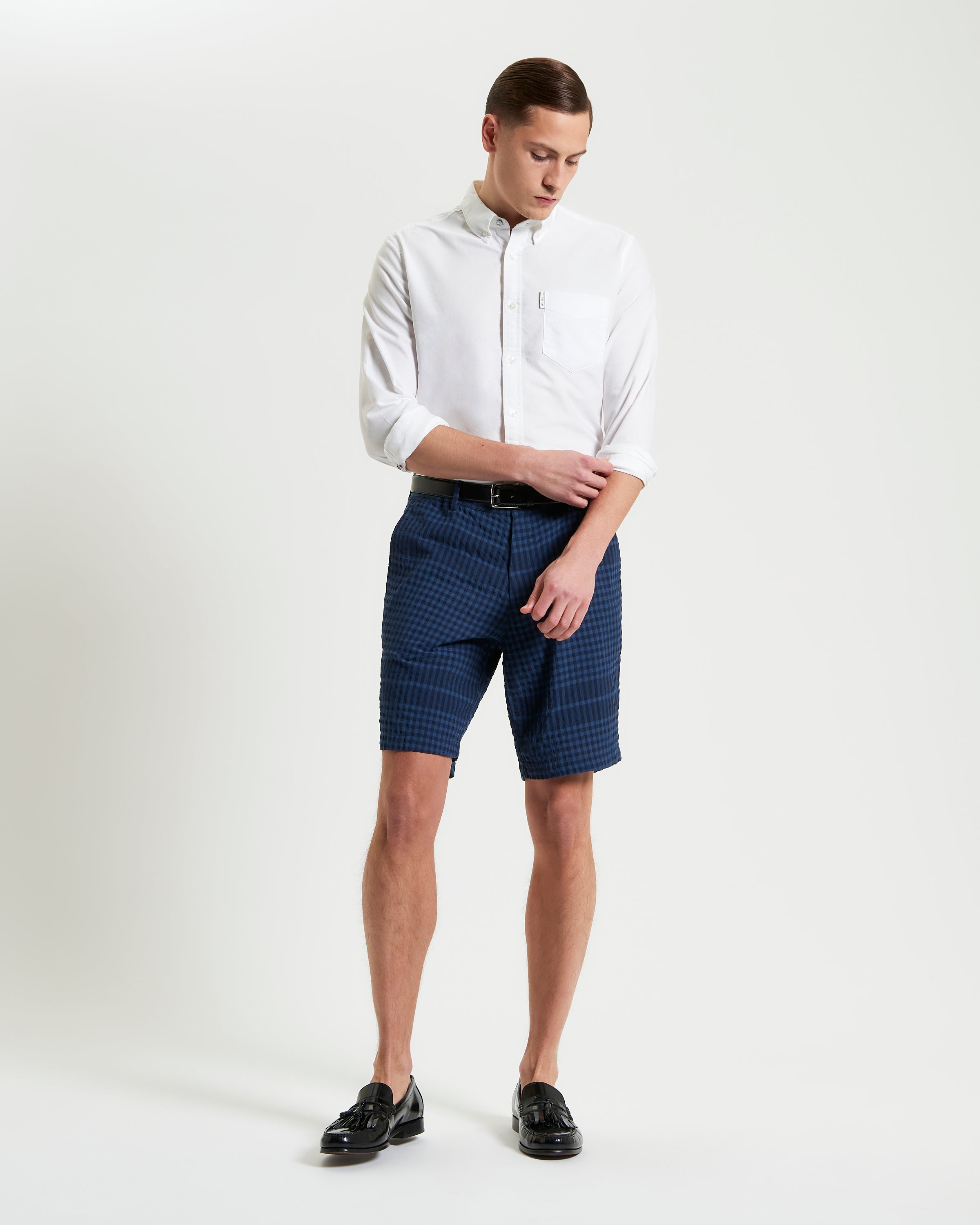 Seersucker Check Short modeled with a button-up shirt, showcasing a stylish summer look.