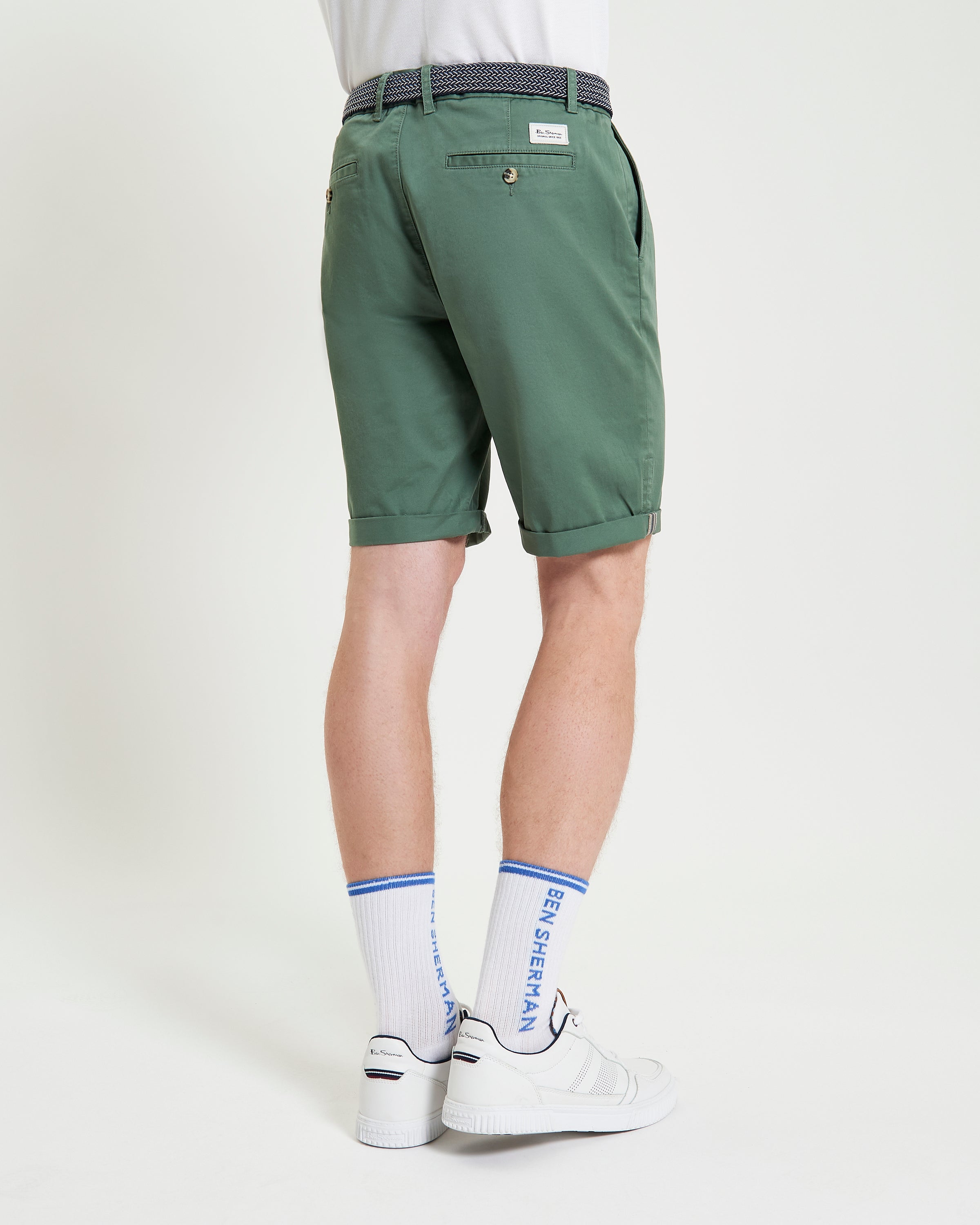 Signature Chino Short – green chino shorts showcasing branded details and tailored fit.