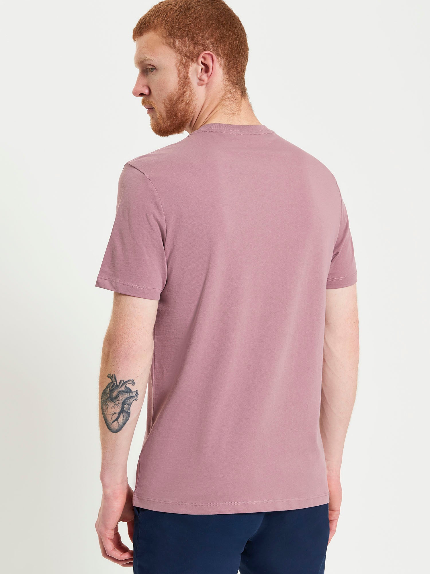Signature Tee – back view in light pink, crew neck, regular fit, comfortable organic cotton.
