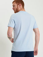 Signature Tee – Light Blue – Crew Neck Regular Fit back view of a man wearing premium organic cotton tee.