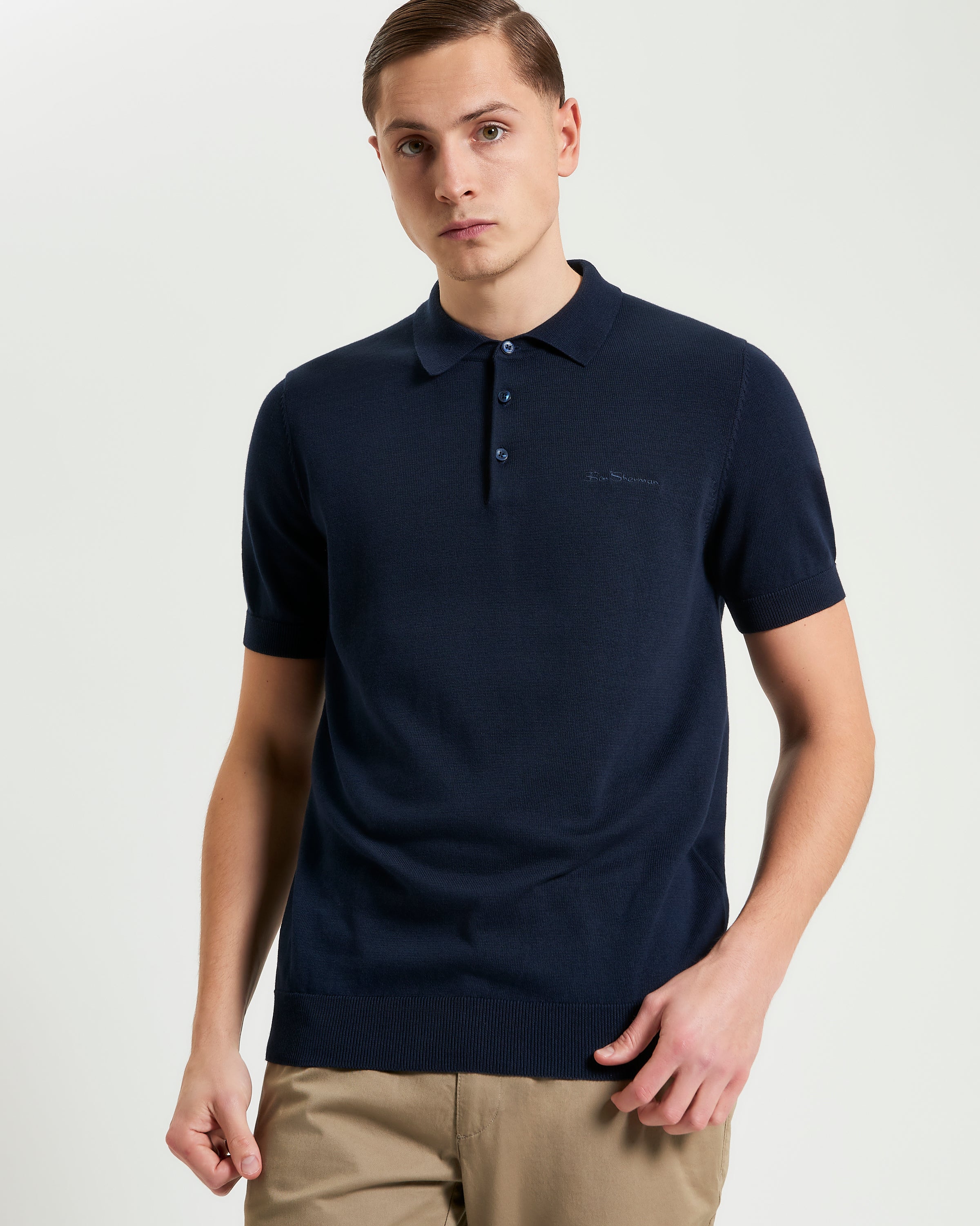Signature Short Sleeve Polo – Navy Blue – Premium knit construction with ribbed collar and cuffs.