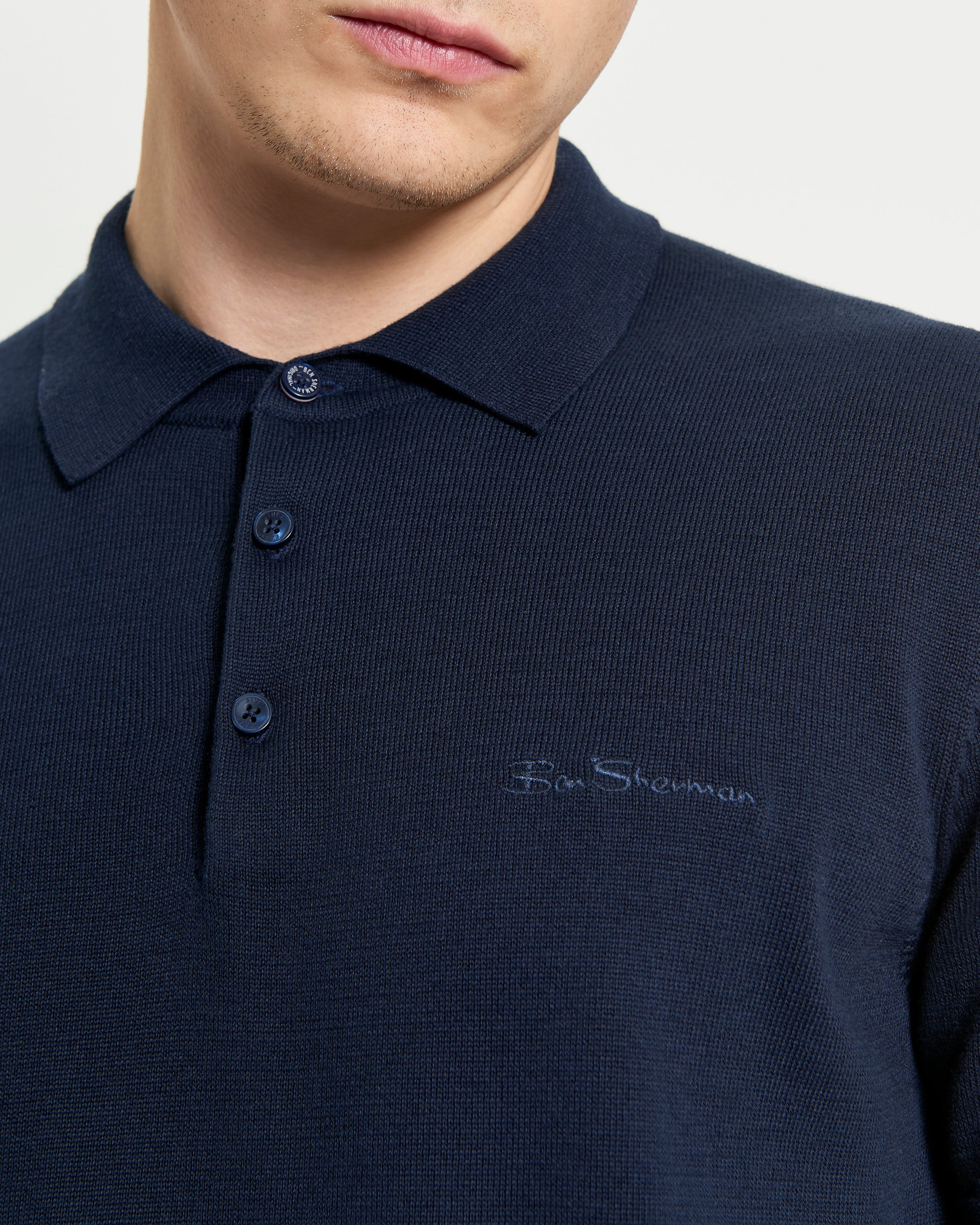 Close-up of the Signature Short Sleeve Polo featuring ribbed collar and Ben Sherman branding.