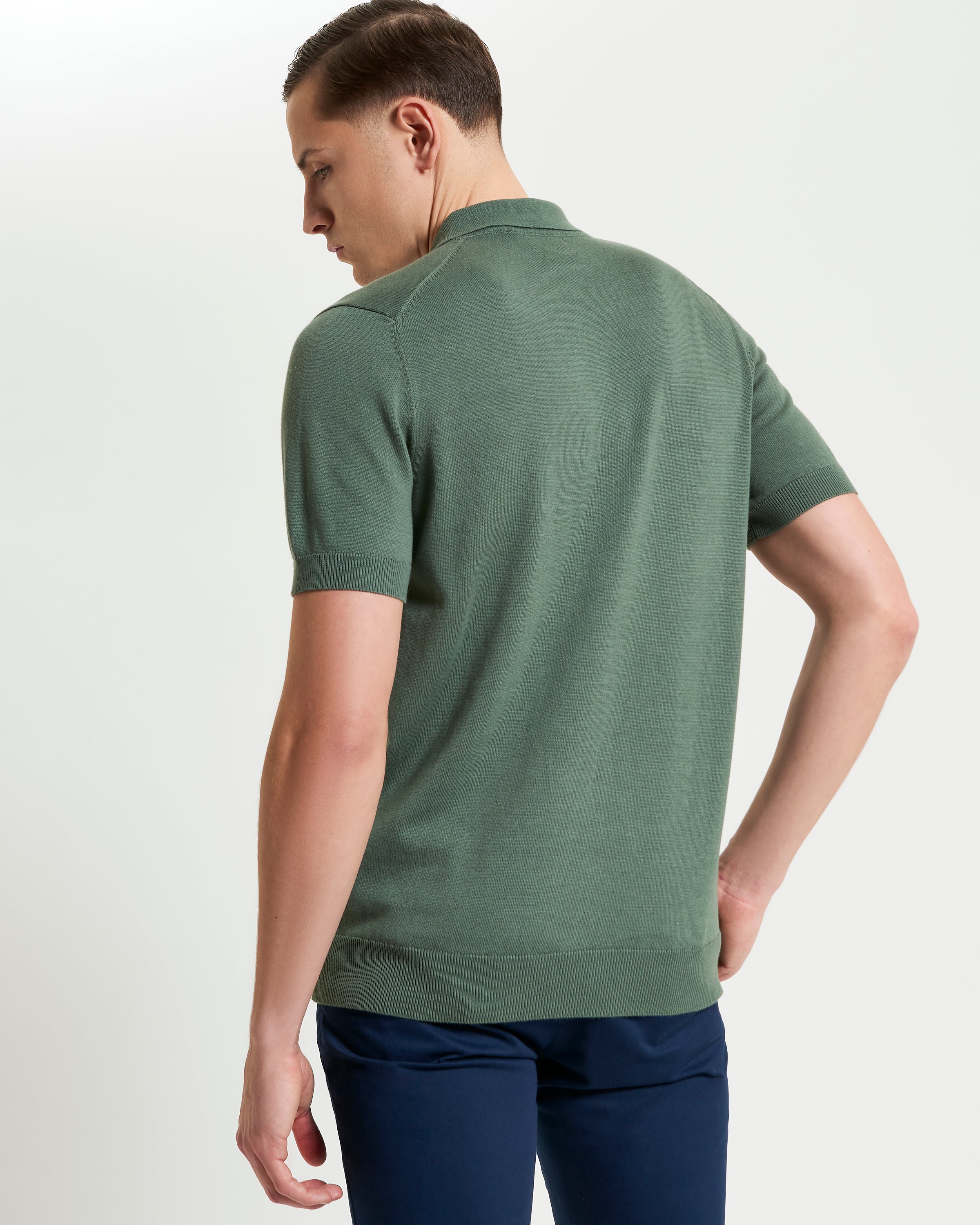 Signature Short Sleeve Polo – green – featuring a ribbed collar and cuffs, premium knit construction.