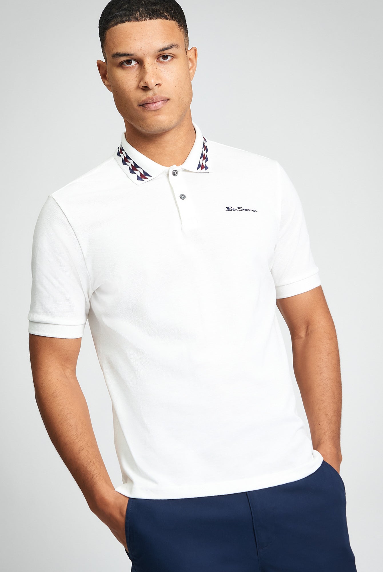 Collar Interest Polo β White β Featuring a patterned collar detail and Ben Sherman embroidery on the chest.