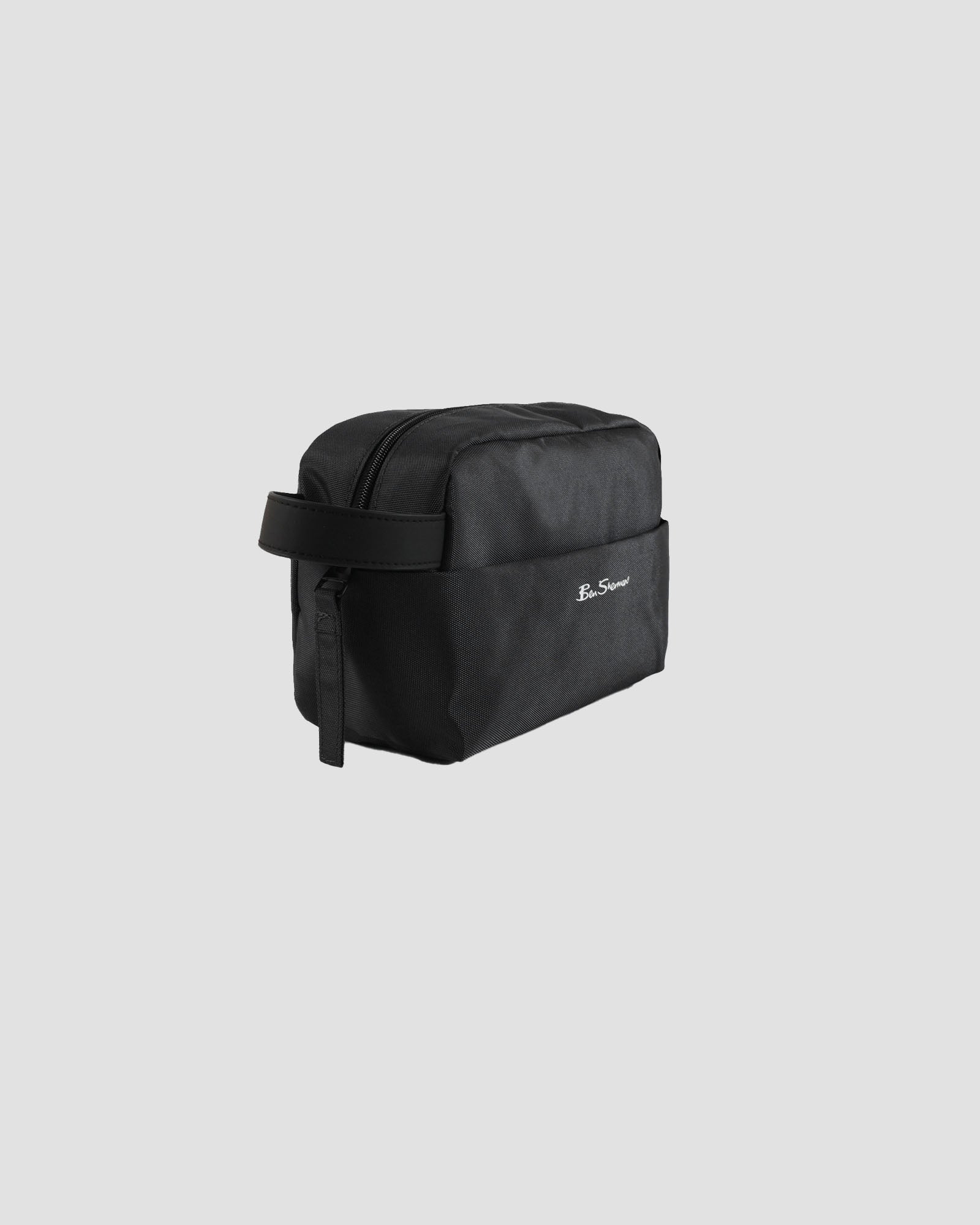 Toiletry Bag – Lightweight black travel bag with fold out pocket and zip closure.