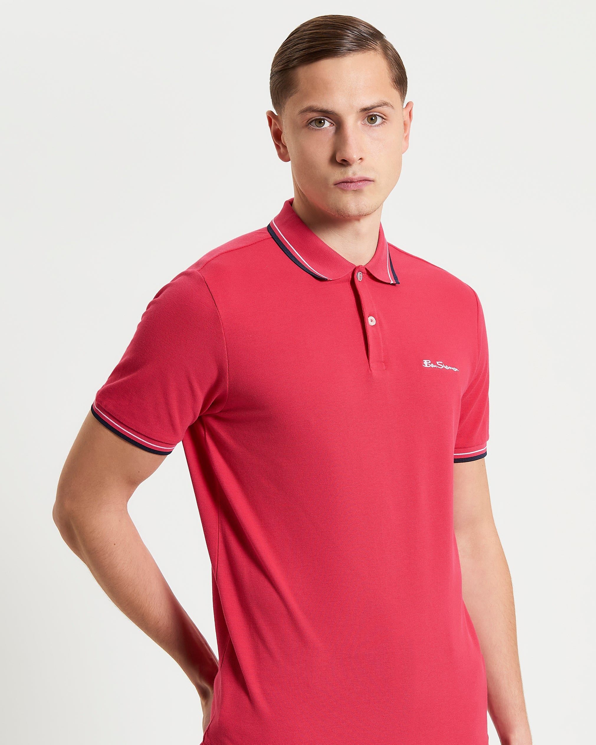 Man wearing Ben Sherman Signature Pique Polo in Cerise