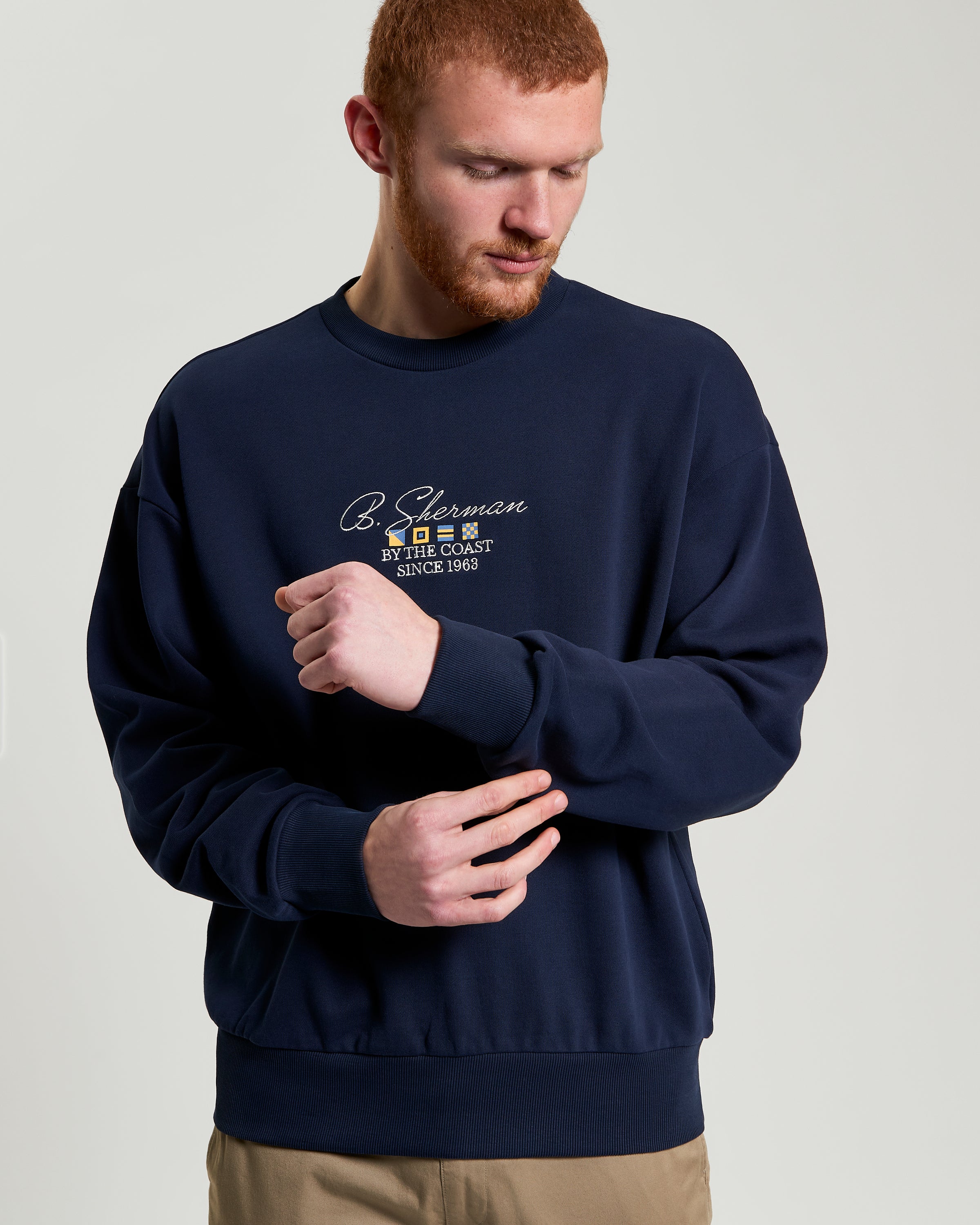 By The Coast Crew sweatshirt by Ben Sherman, relaxed fit in navy color, featuring tonal chest embroidery.