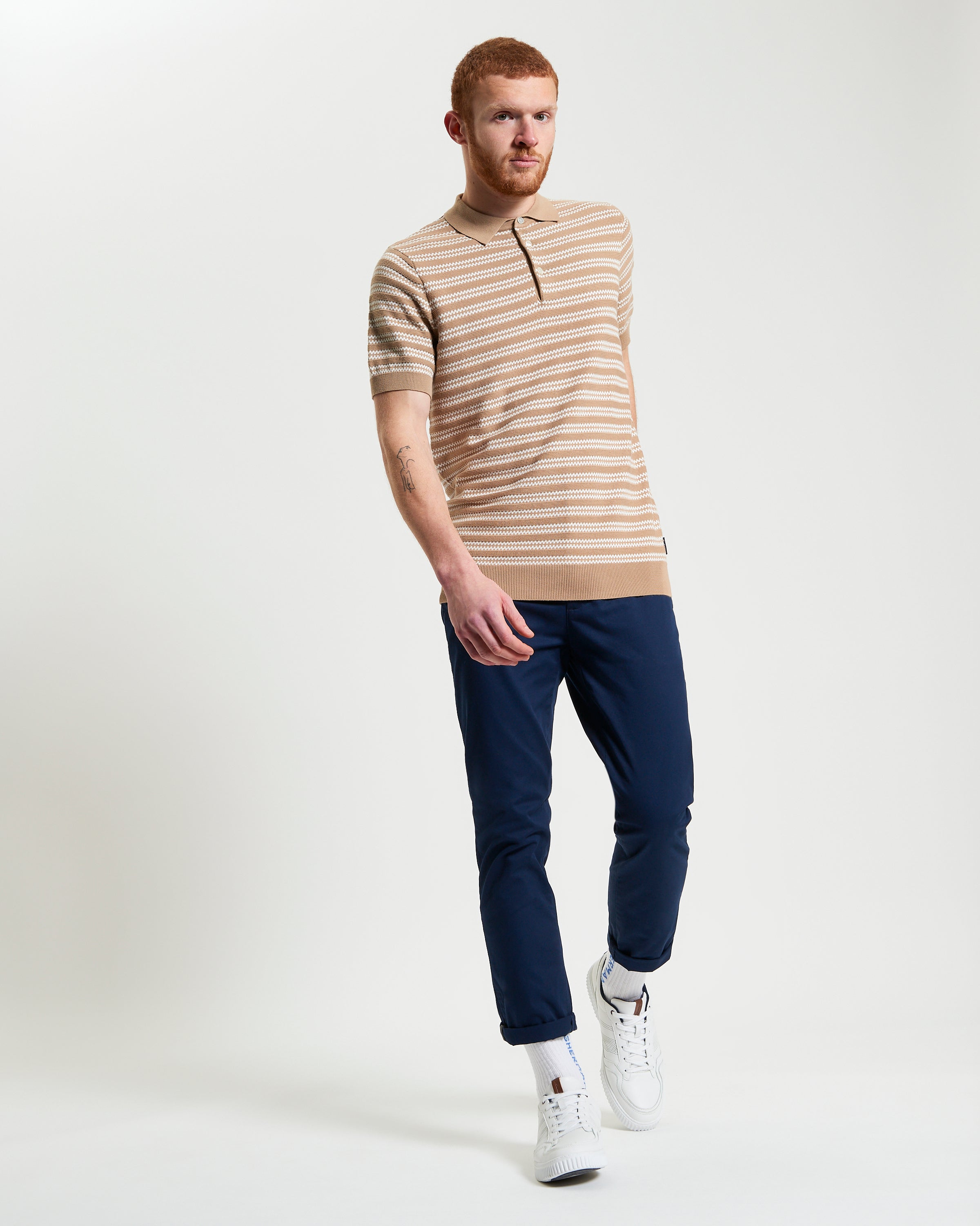 Jacquard Stripe Polo – beige and cream striped shirt, worn with navy pants, casual summer outfit for men.