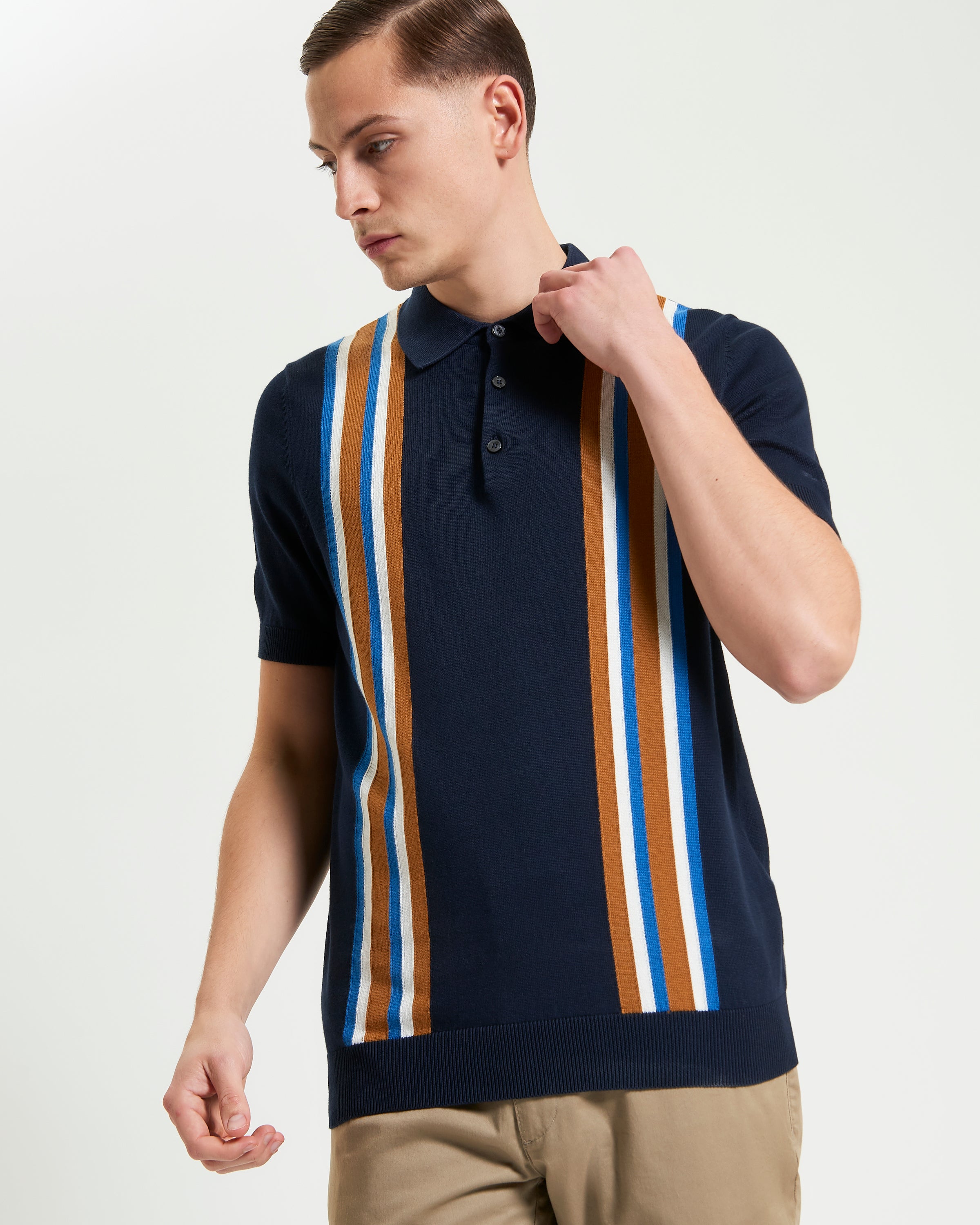 Vertical Stripe Polo – navy blue with bold vertical stripes, perfect for casual weekend styling.