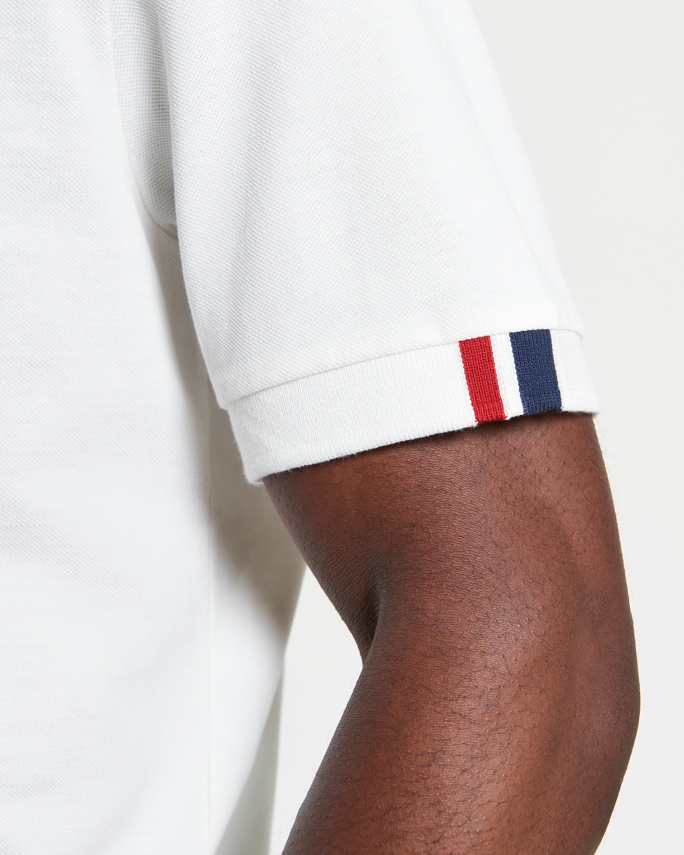 Tipped Pique Tee – white color featuring a striped detail on the arm cuff by Ben Sherman.