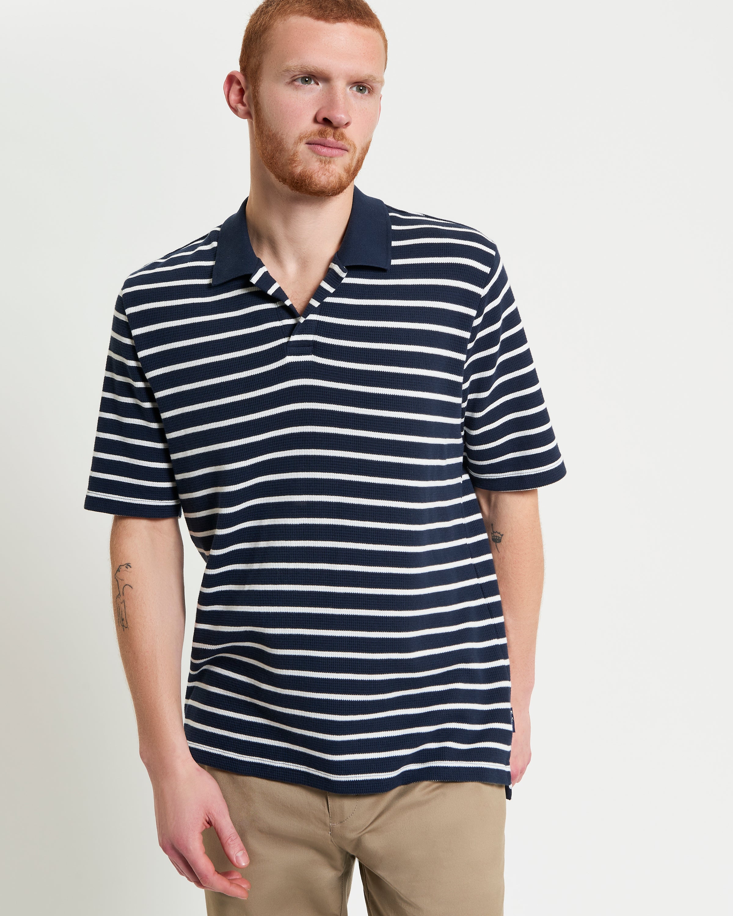 Waffle Stripe Polo – navy and white horizontal stripes in a relaxed fit with an open neck placket by Ben Sherman.