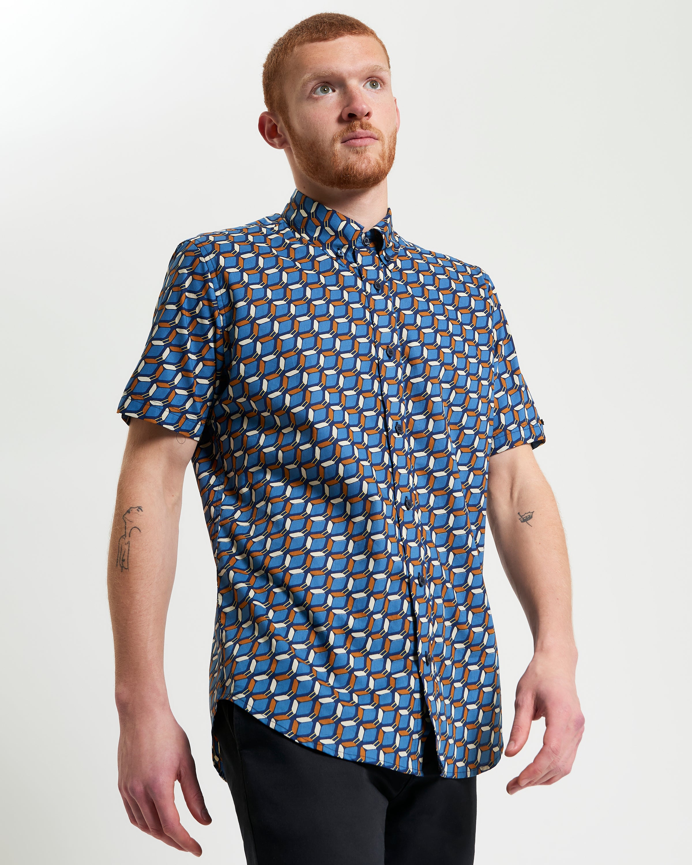 Retro Geo Print shirt featuring bold vintage-inspired design and vibrant geometric pattern.