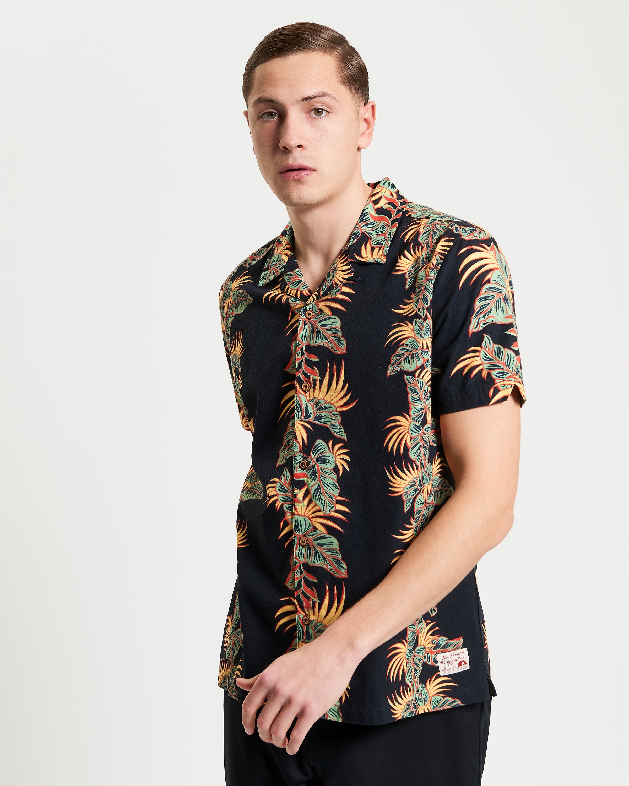 Botanical Leaf Print short sleeve shirt with tropical leaves design and revere collar, perfect for summer.