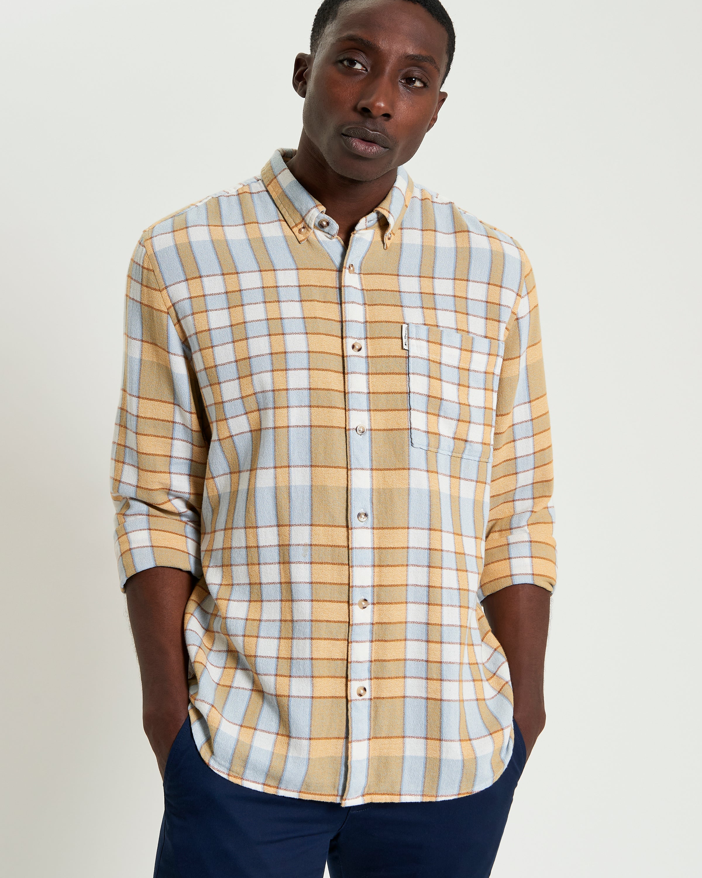 Crepe Check – yellow and blue check shirt with long sleeves and button-down collar.