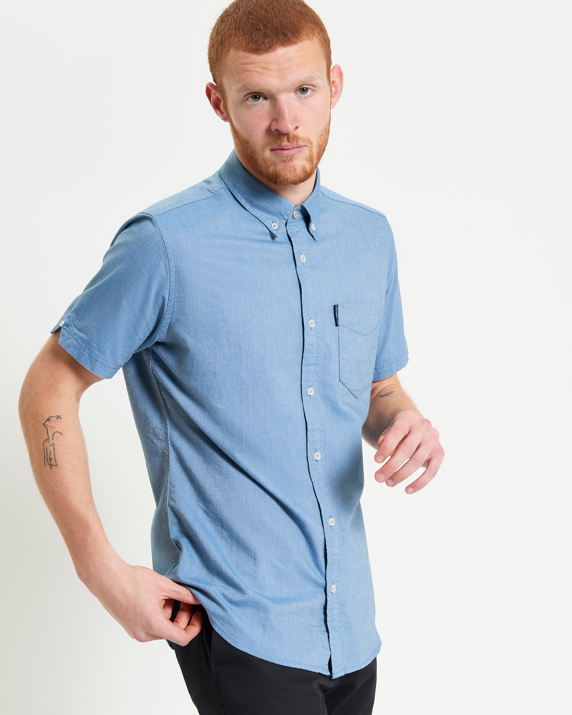 Signature Oxford Short Sleeve Shirt – light blue with short sleeves and chest pocket.