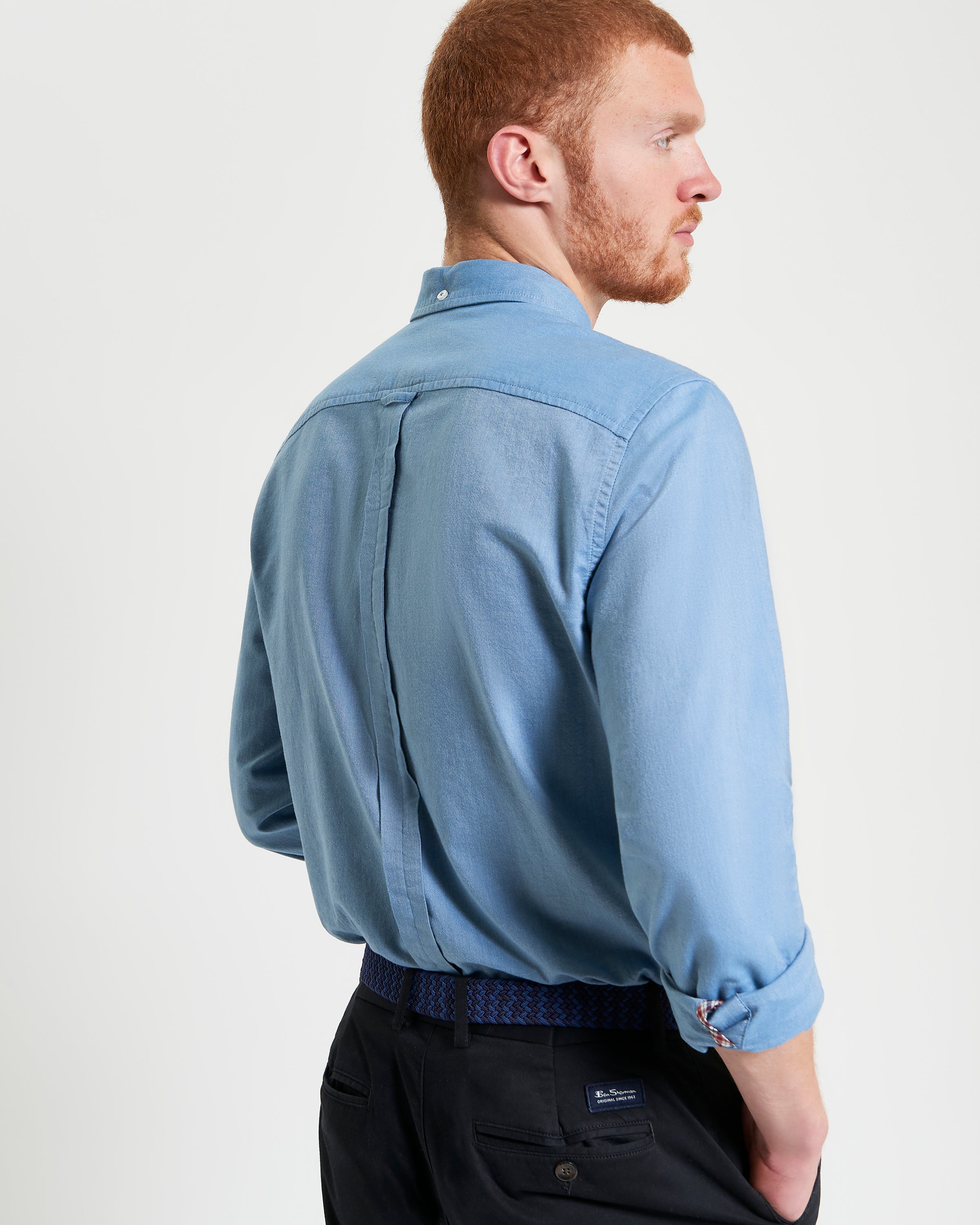 Signature Oxford Long Sleeve Shirt – blue – back view on model showing button-down collar and ease of movement.