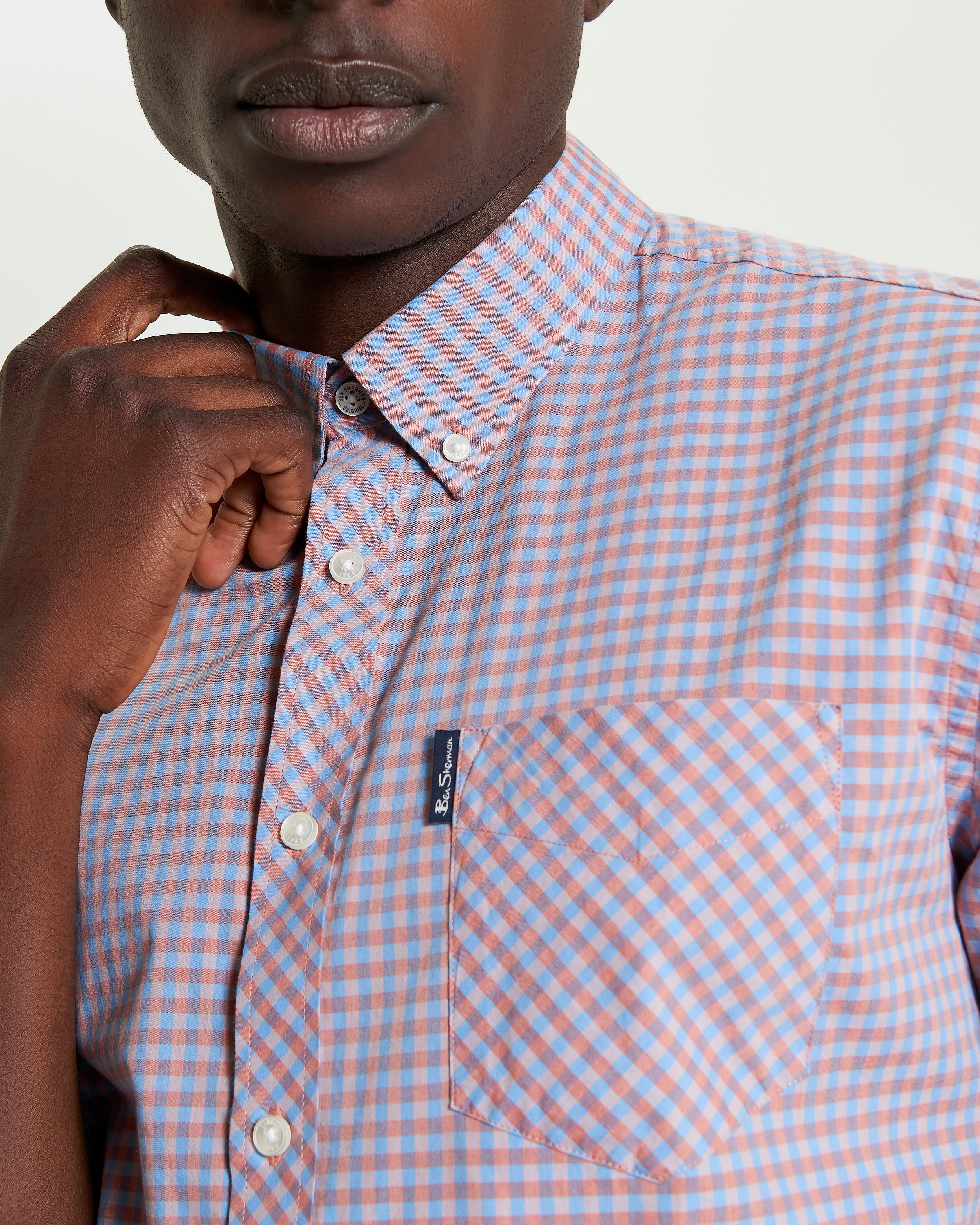 Signature Gingham Short Sleeve Shirt – orange and blue check pattern with button-down collar and chest pocket