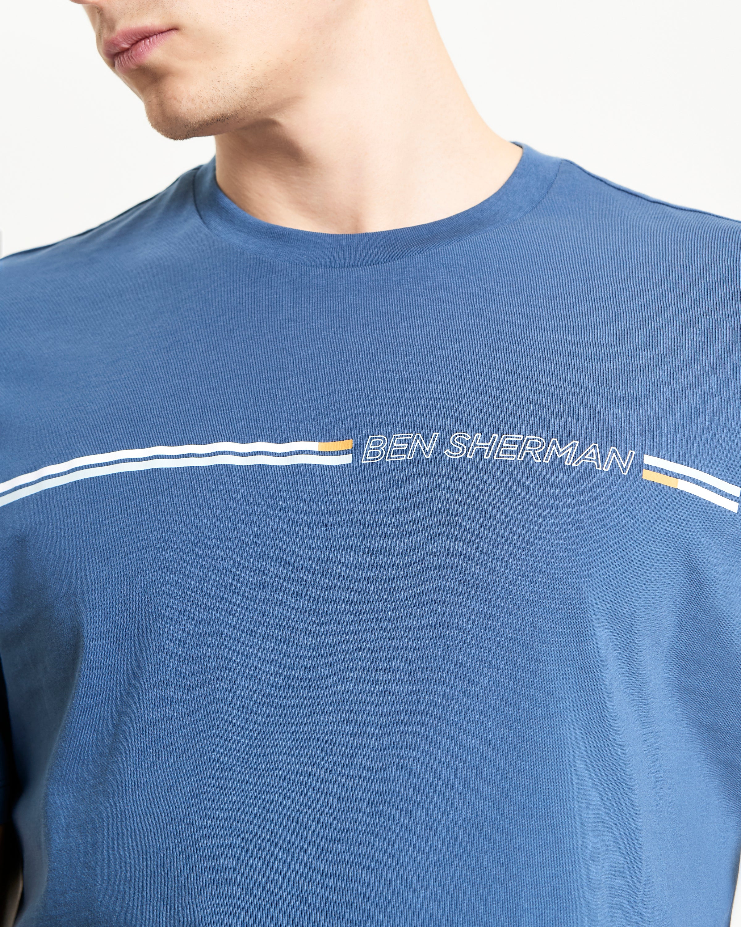 Core Striped Tee – Ben Sherman shirt in blue with seasonal stripes and logo design.