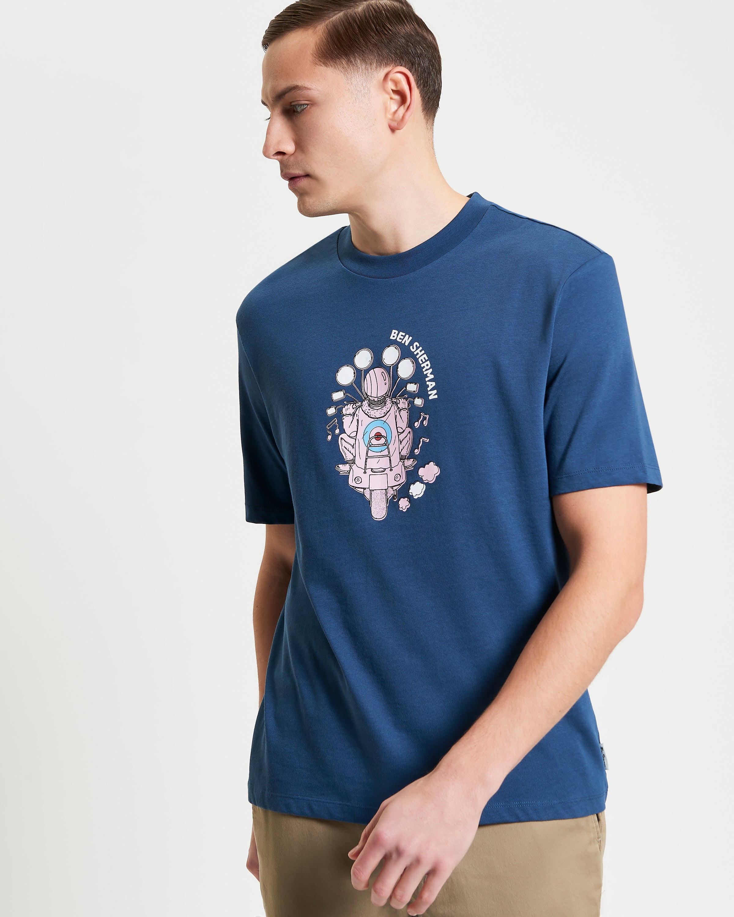 Mod Scooter Tee featuring a bold scooter graphic on a model, showcasing classic British subculture style.