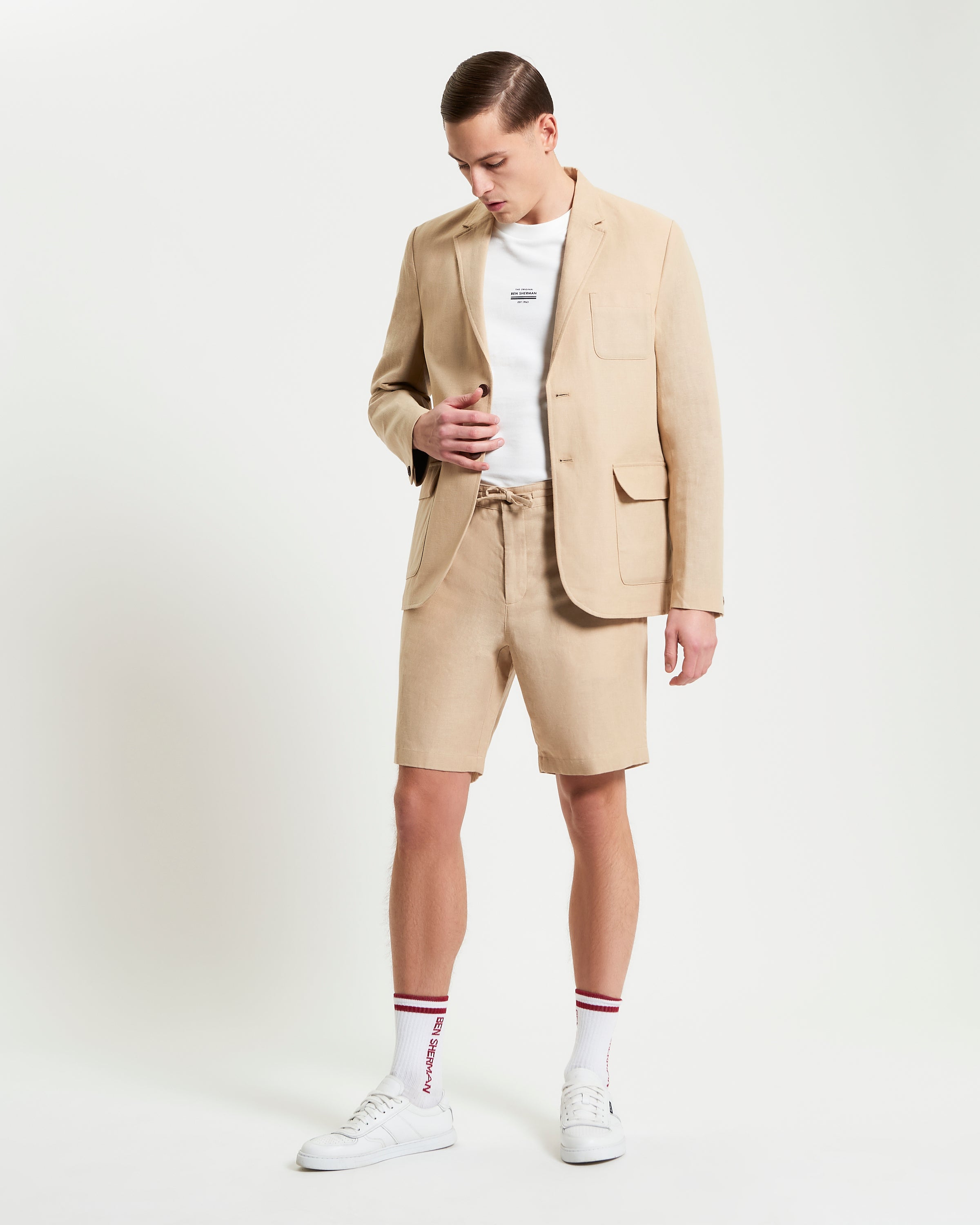 Linen Cotton Drawcord Short – beige, styled with a matching blazer, perfect for warm weather outfits.