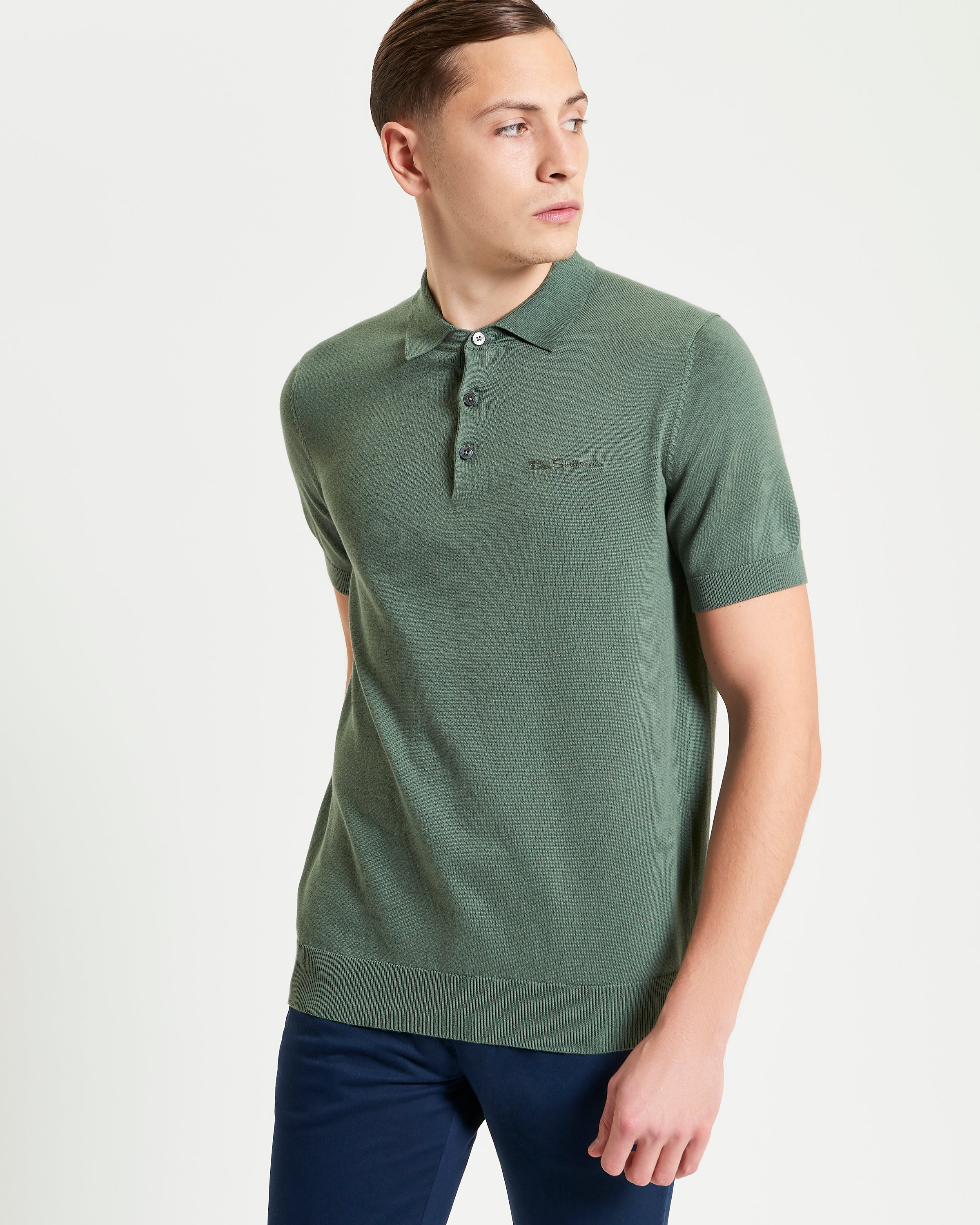 Signature Short Sleeve Polo – green, featuring ribbed collar and cuffs, a clean two-button placket, and sleek fit.