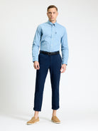 Linear Gingham – blue long sleeve shirt with button-down collar, styled with navy pants and casual shoes.