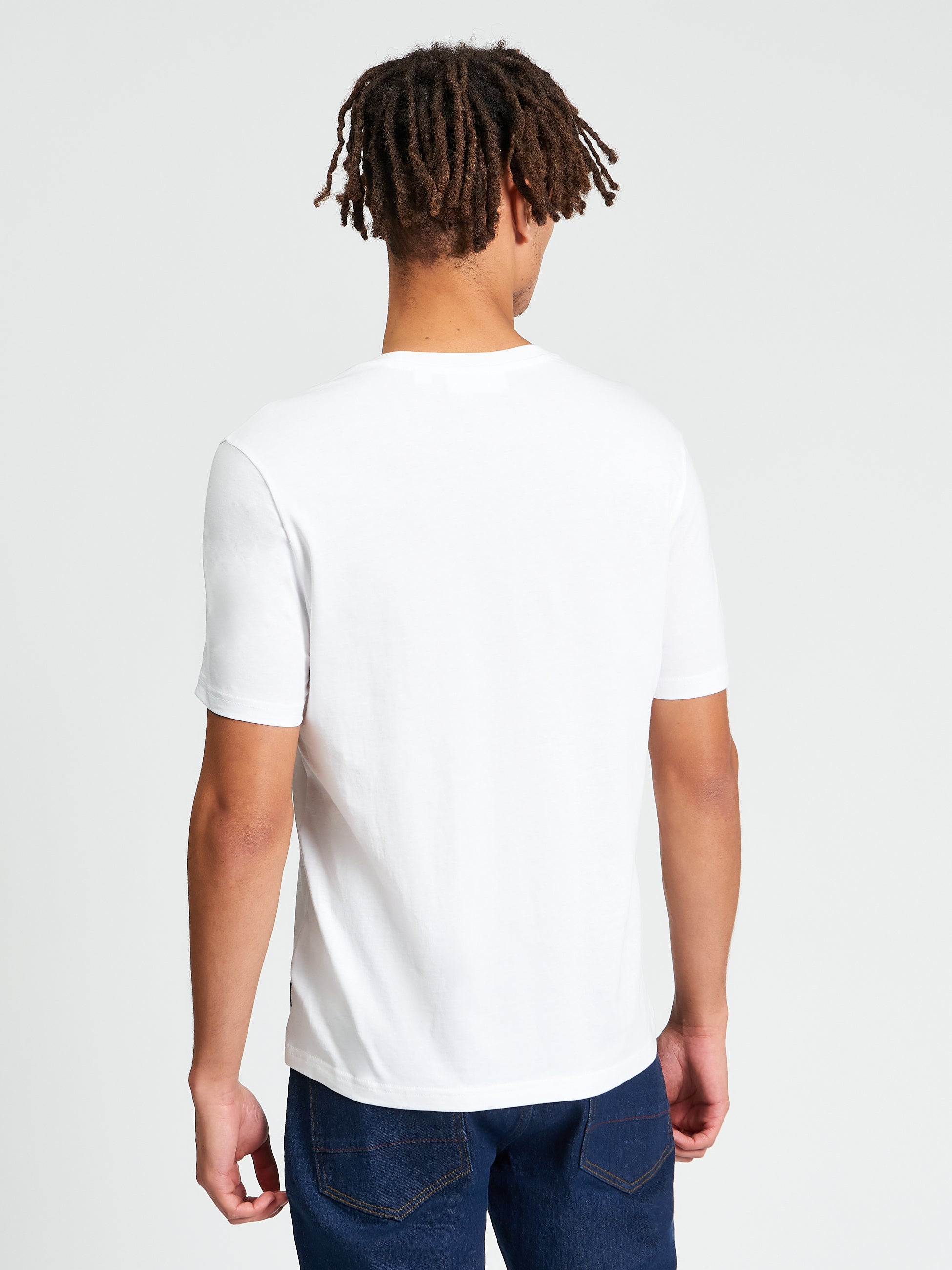 The Start Line Tee – back view of a model wearing a white organic cotton t-shirt by Ben Sherman.