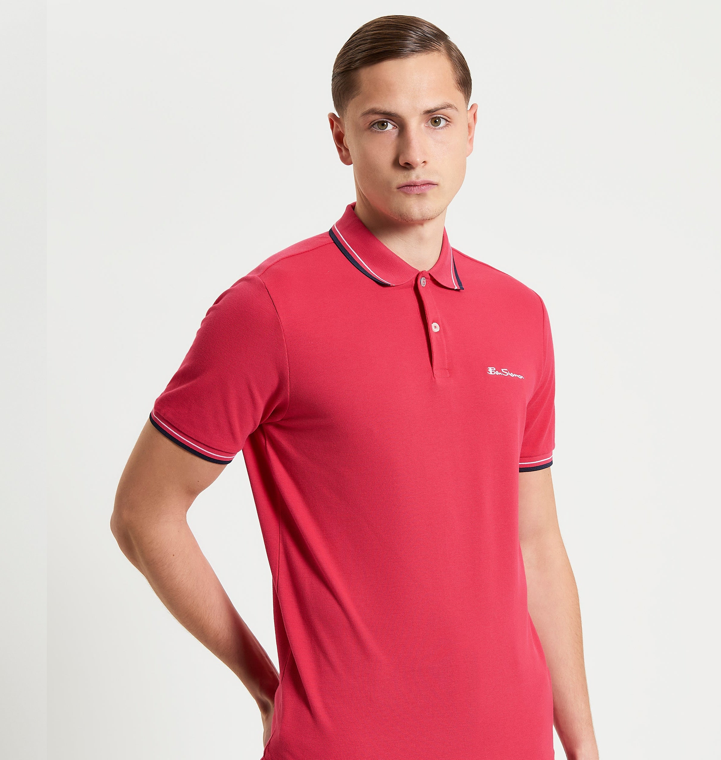 Man wearing Ben Sherman Signature Pique Polo in Cerise
