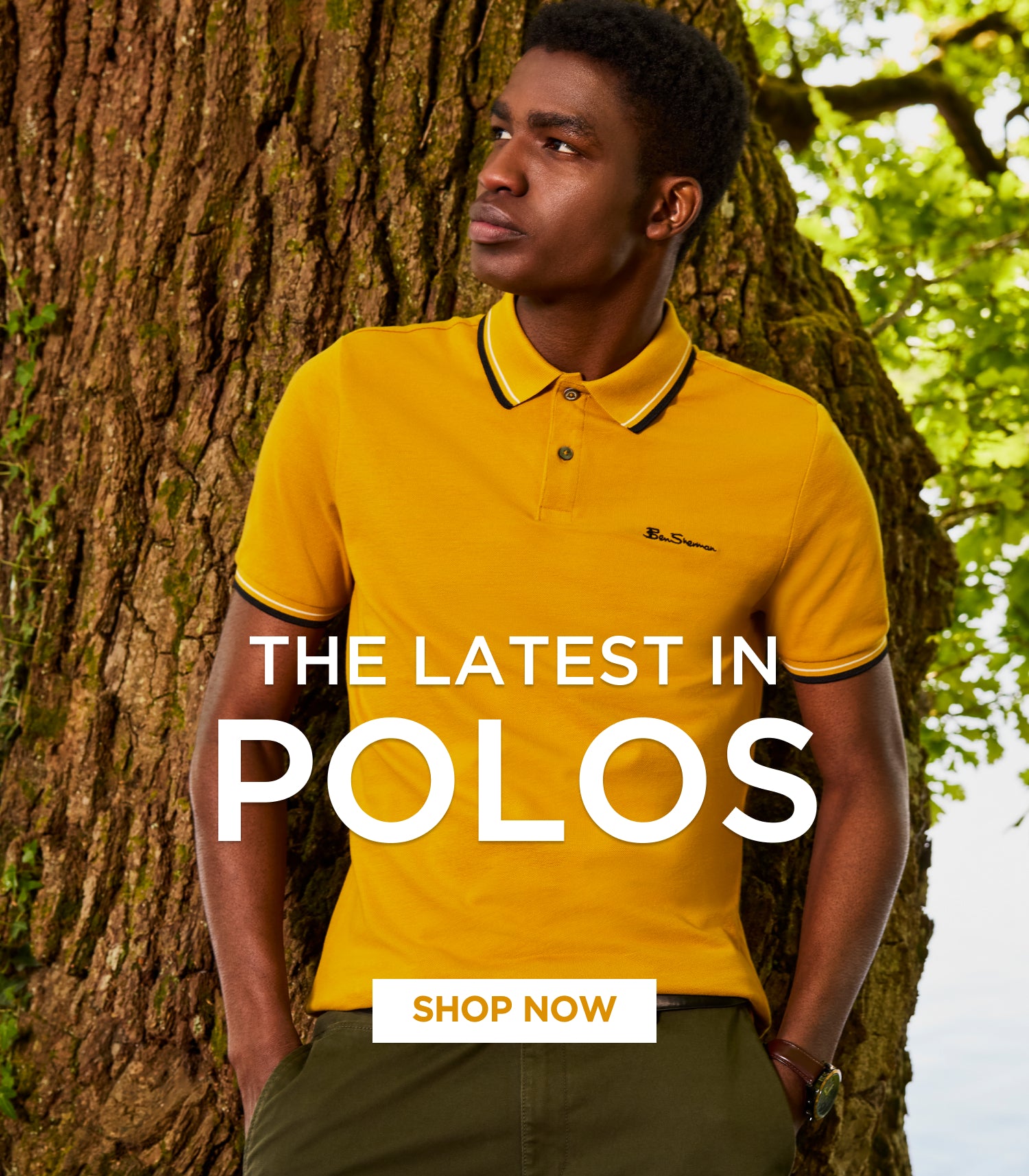 Man wearing a orange Ben Sherman polo shirt leaning against a tree with promotional text overlay.